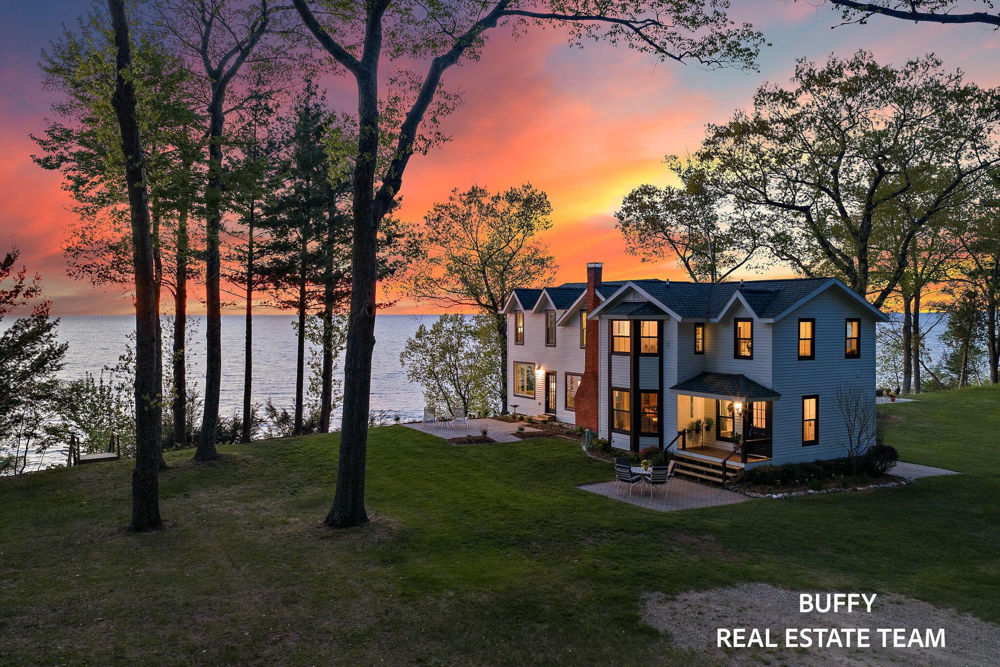 Image 2: Main House Exterior Sunset