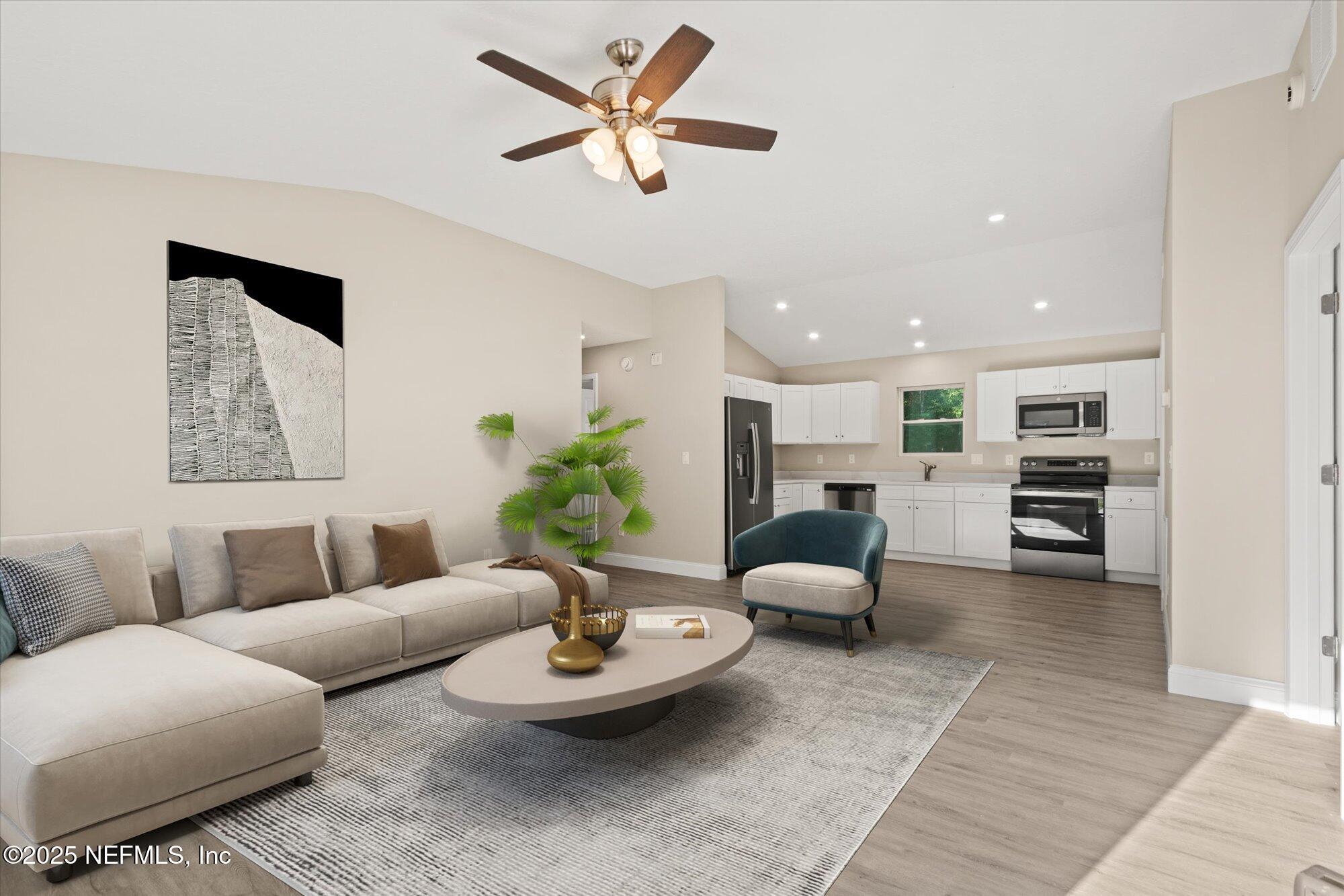Image 2: Living room has been virtually staged