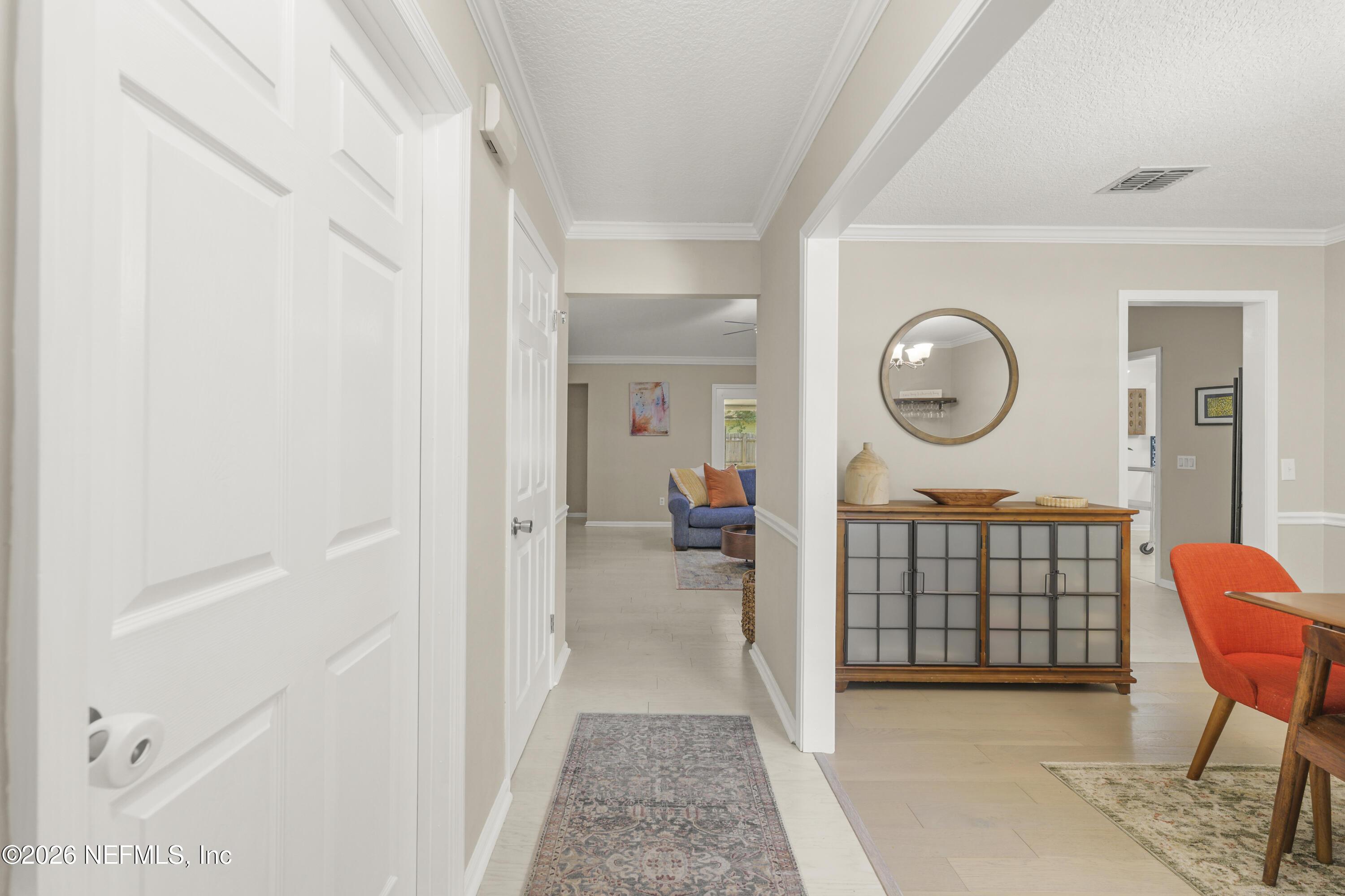 Image 4: Front Entry to Dining Room