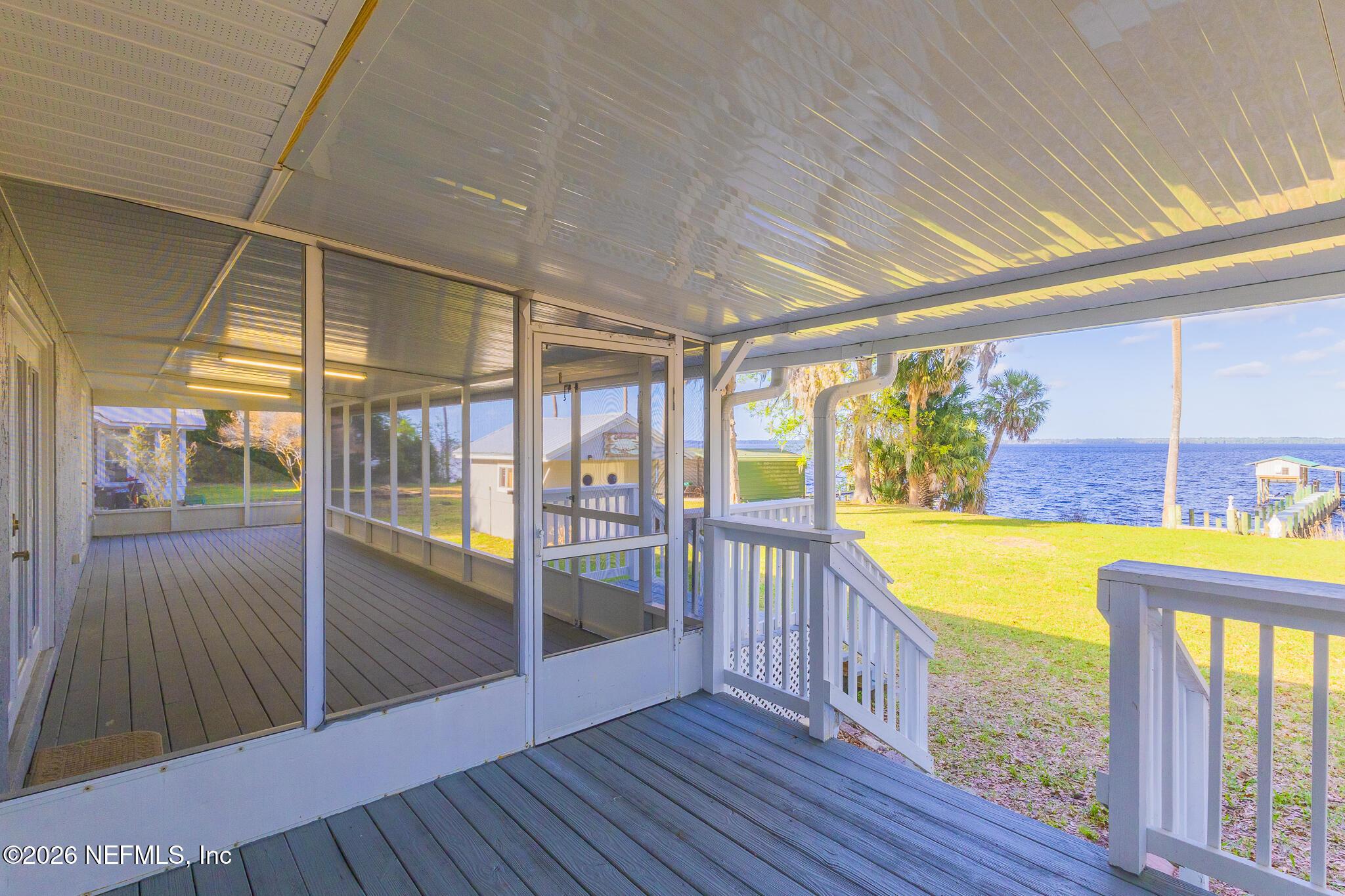 Image 4: Back Porch/Lake View