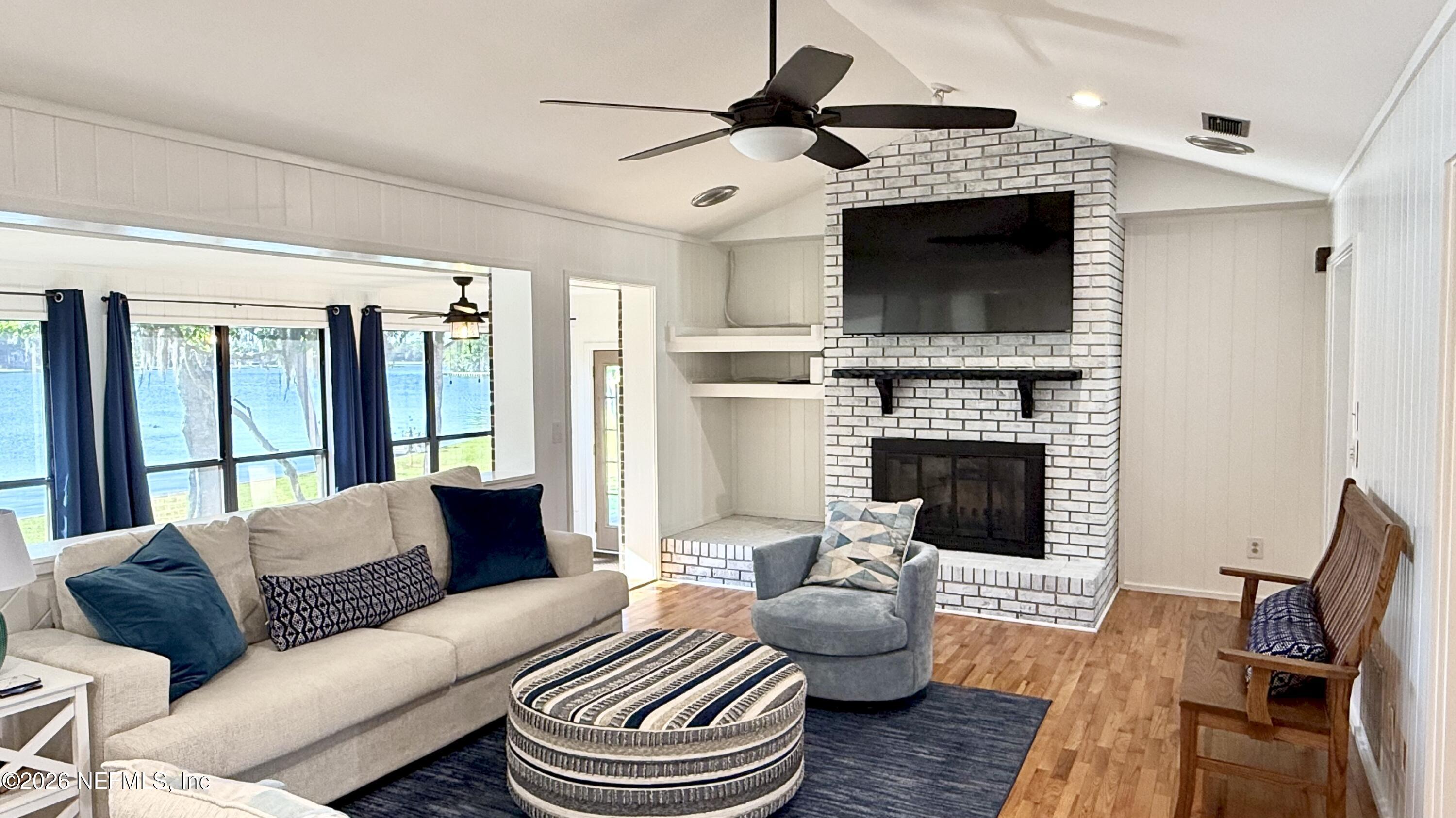 Image 3: Living Room Wood Burning Fireplace