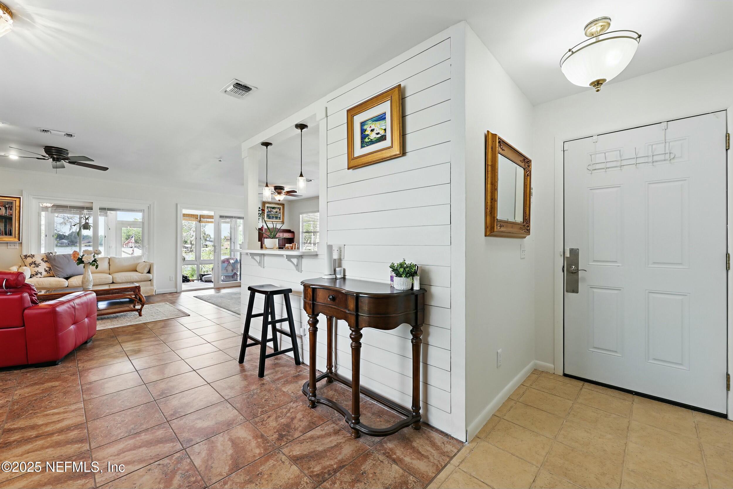 Image 2: entry and living room