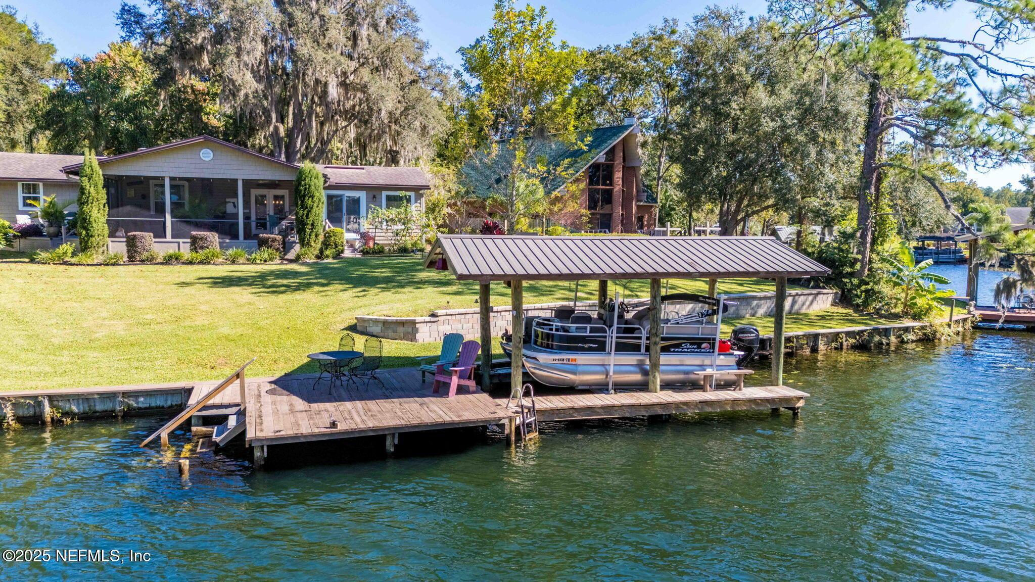 Image 2: Lakefront Covered dock w deck and lift