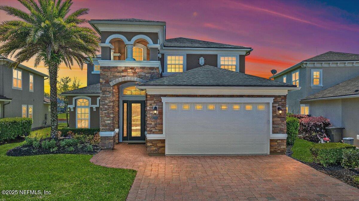 Image 2: 01-Exterior Front at Sunset