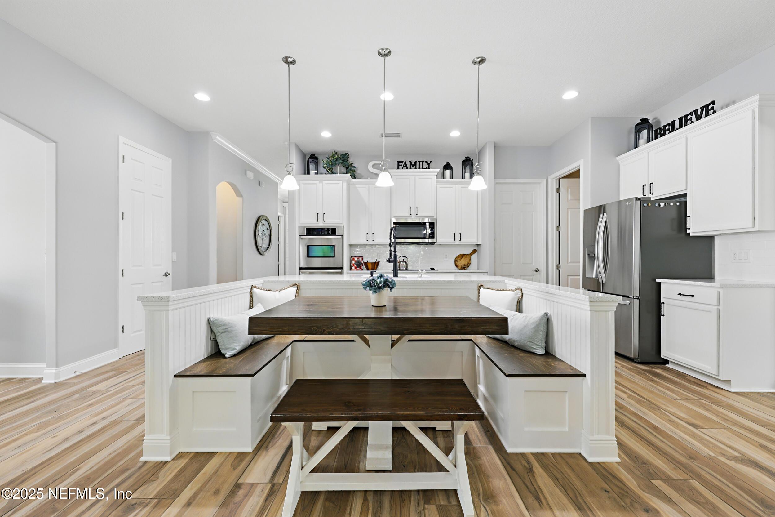 Image 2: custom island with built in seating