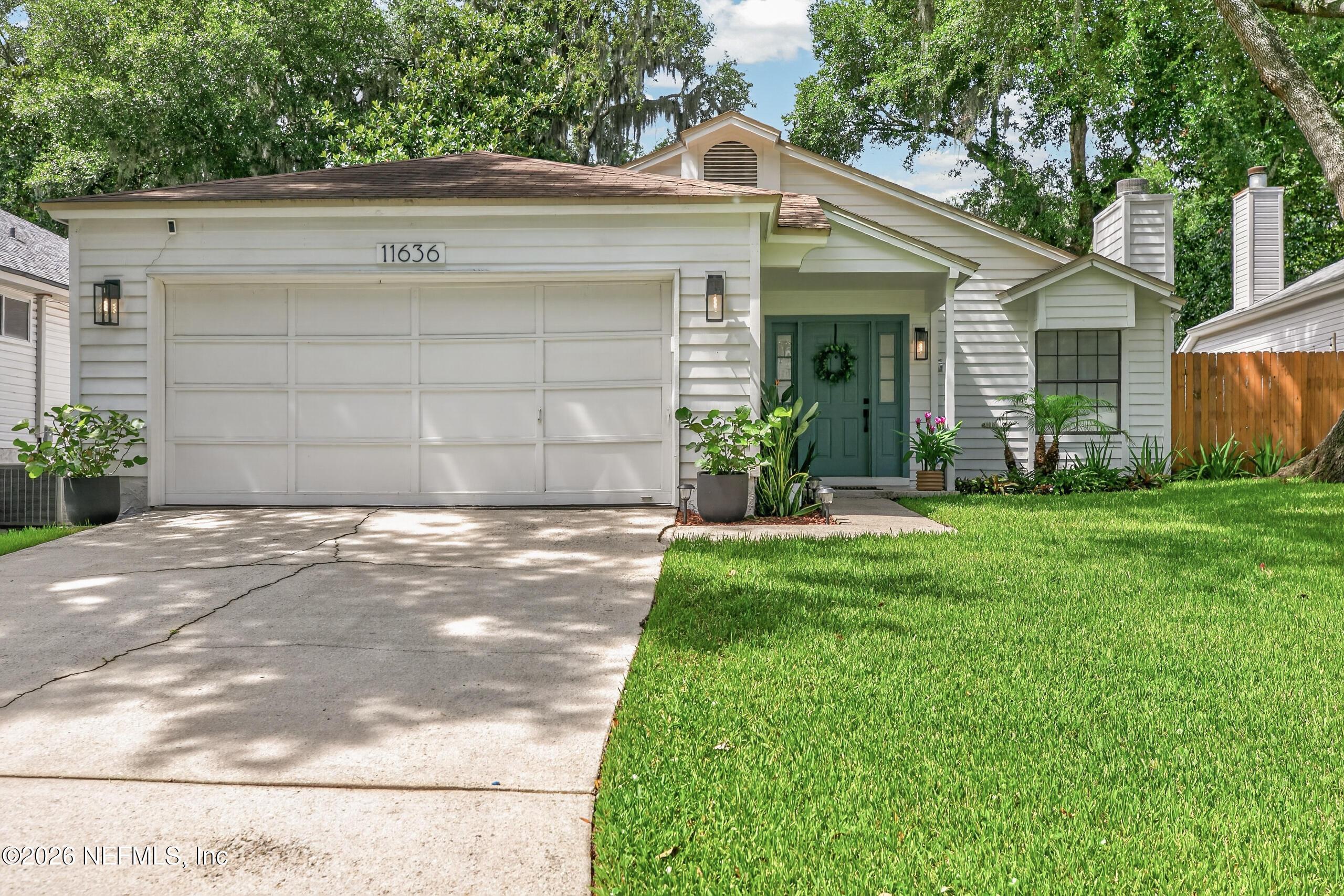 Image 1: Welcome to 11636 Brush Ridge Cir N!