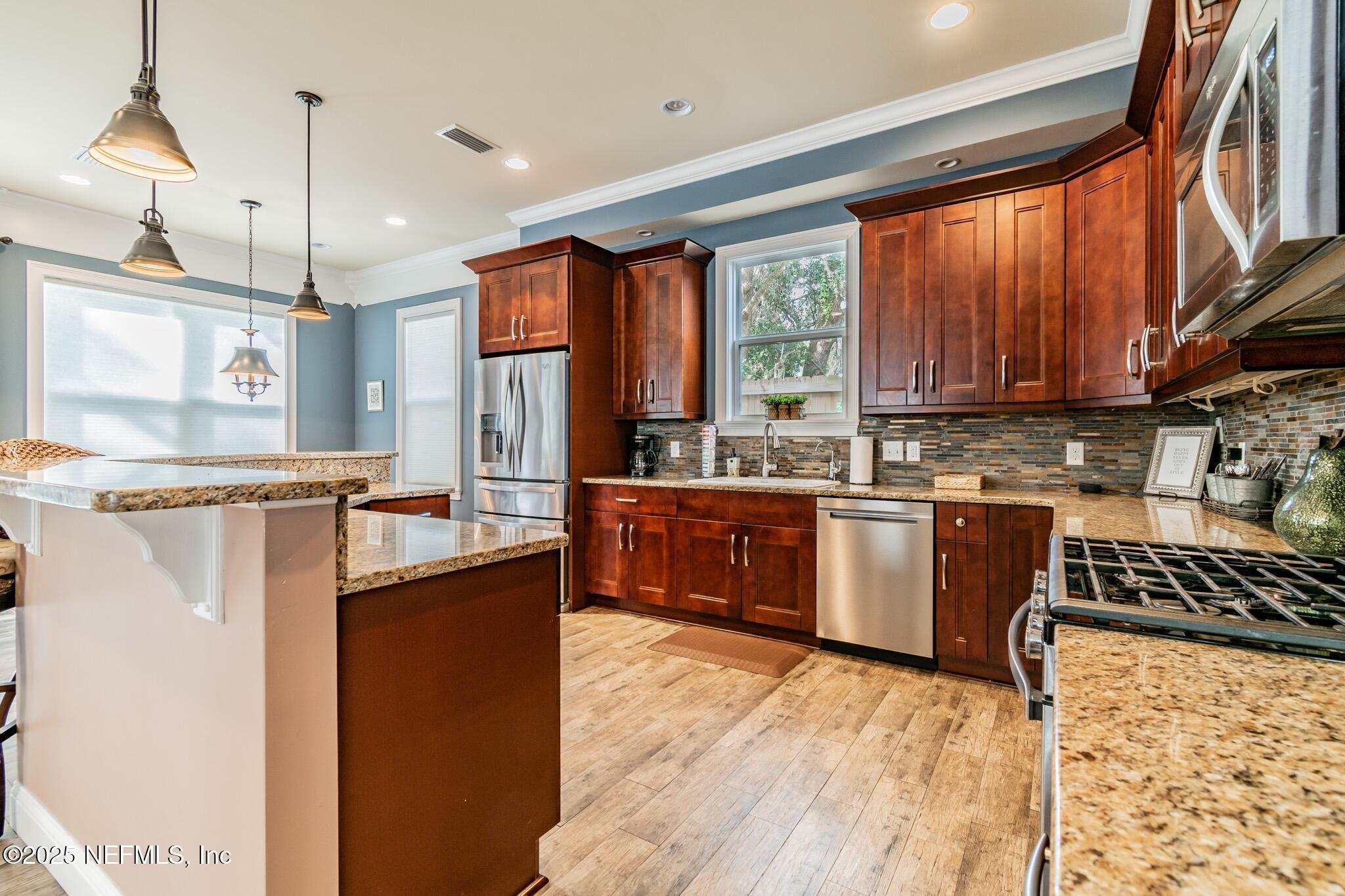 Image 4: Granite countertops/ gas range
