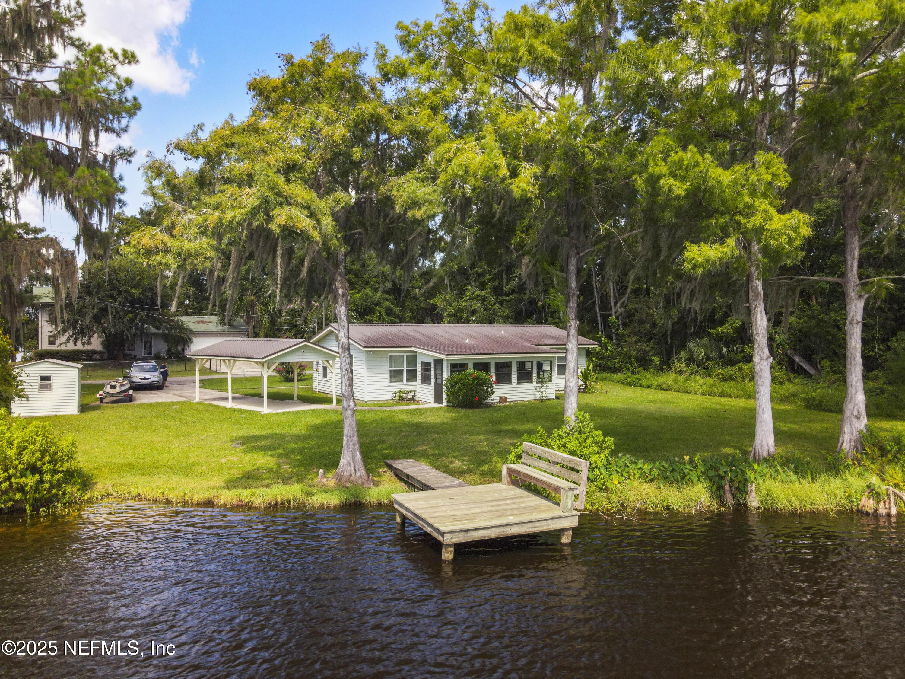 Image 1: 115 Twin Lake Grove Ct, Interlachen, FL