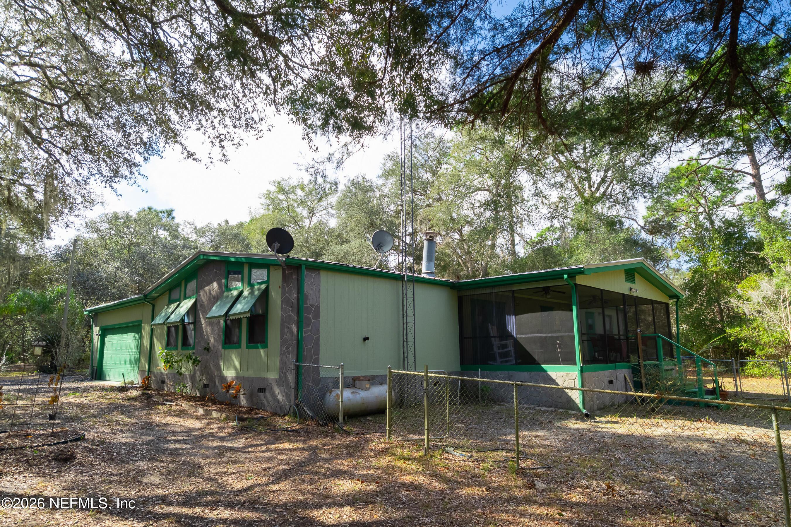 Image 4: Back of home