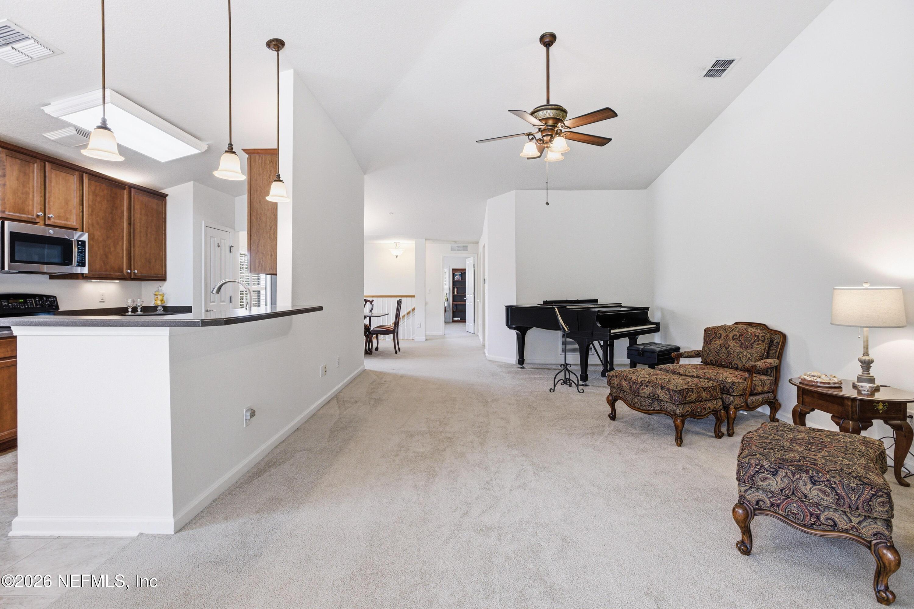 Image 3: Great Room and Open Kitchen