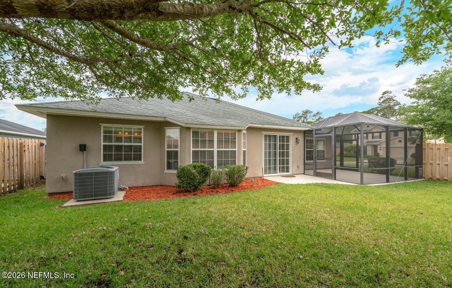 Image 4: backyard with enclosed porch