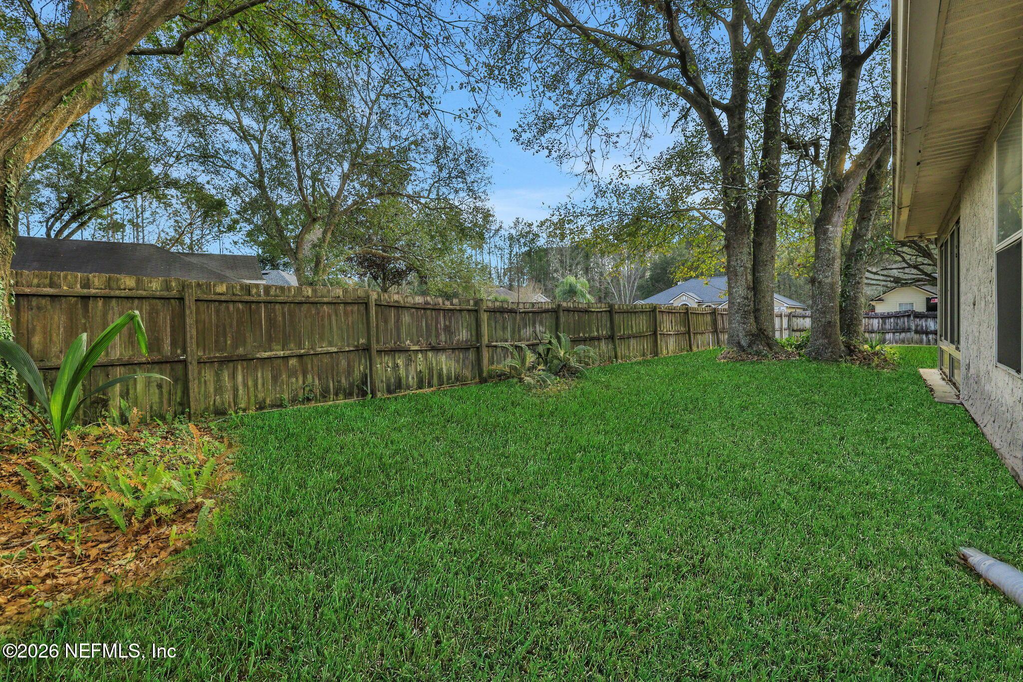 Image 3: Private Fenced Backyard