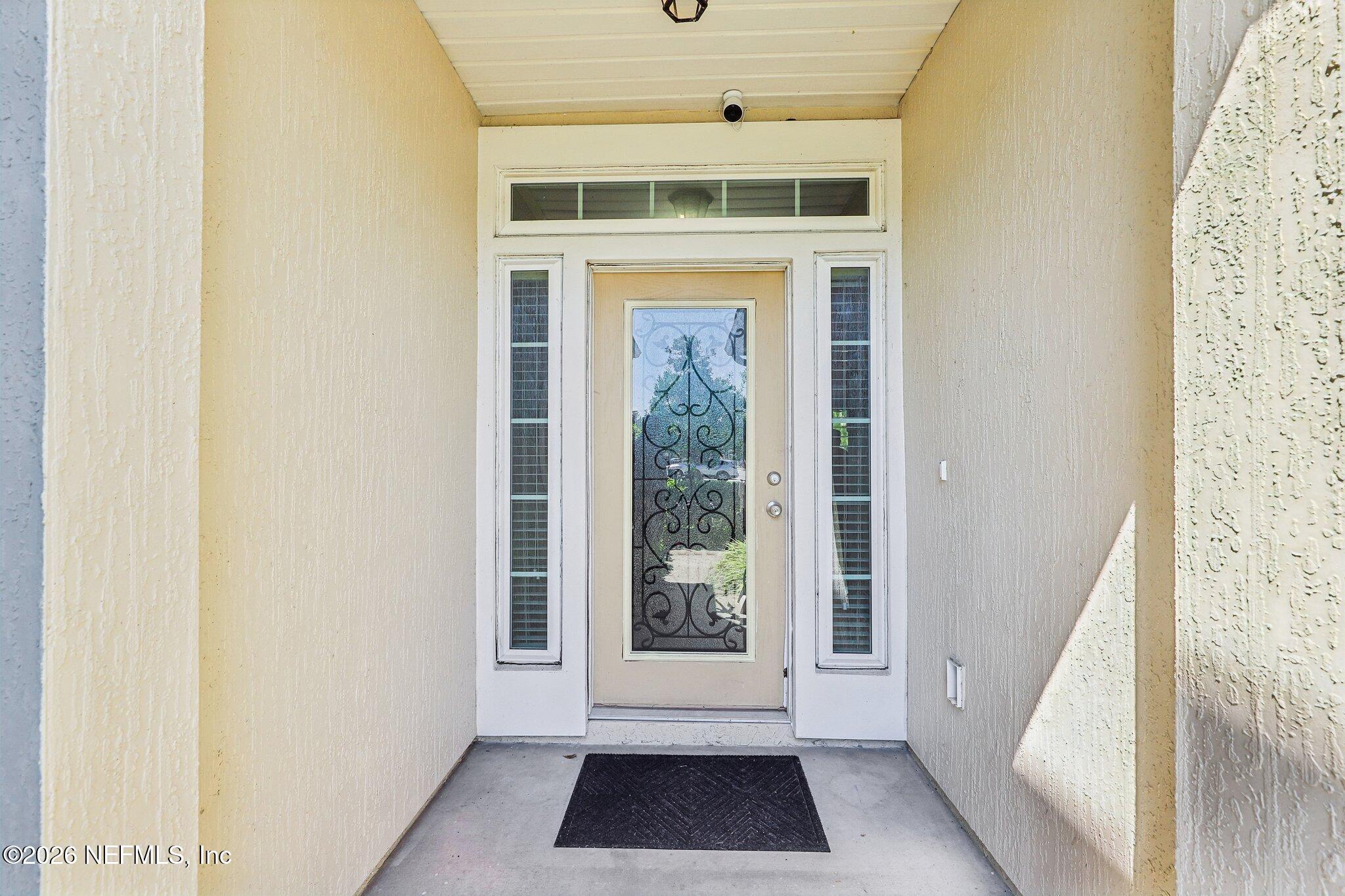 Image 4: Glass front door providing light