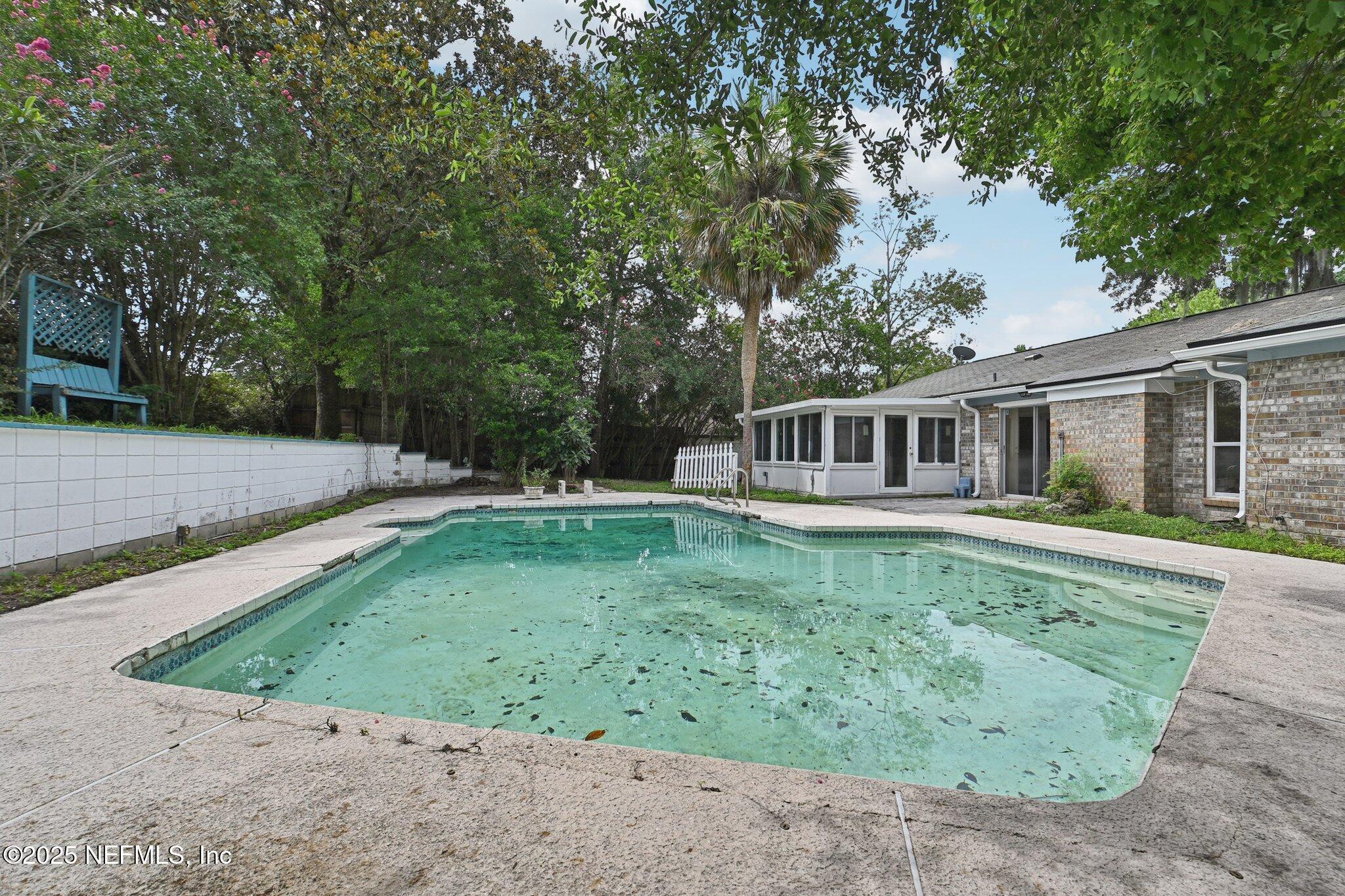 Image 3: POOL AND REAR