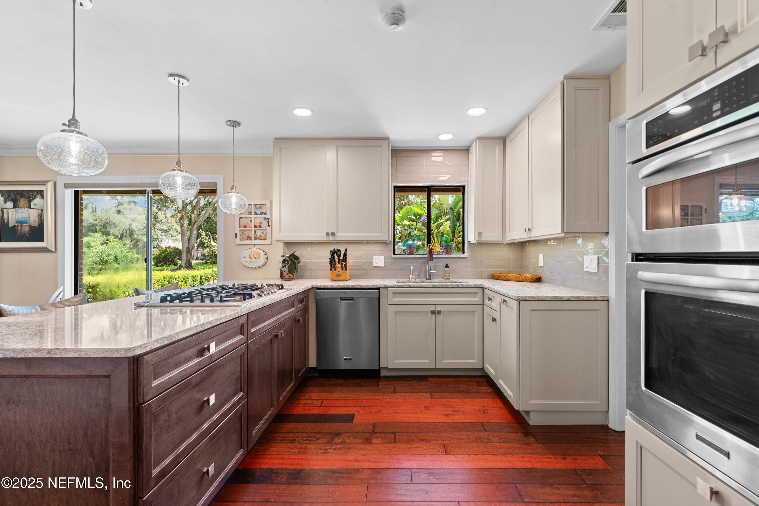 Image 2: Custom Cabinetry with Quartz Countertops