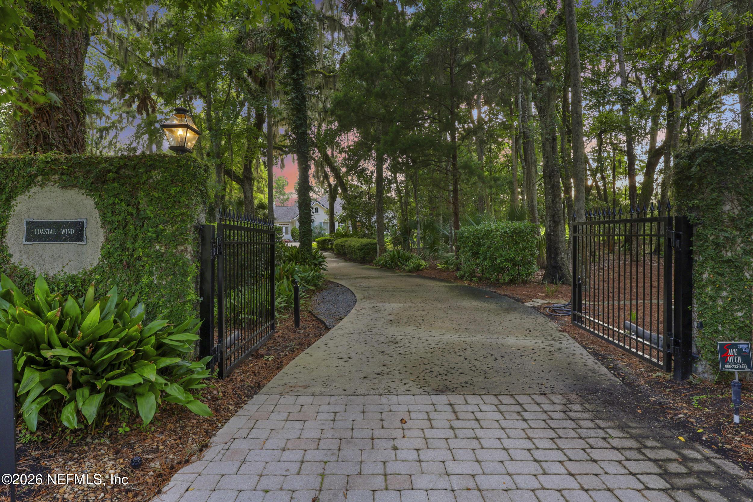 Image 4: PRIVATE GATED ENTRANCE