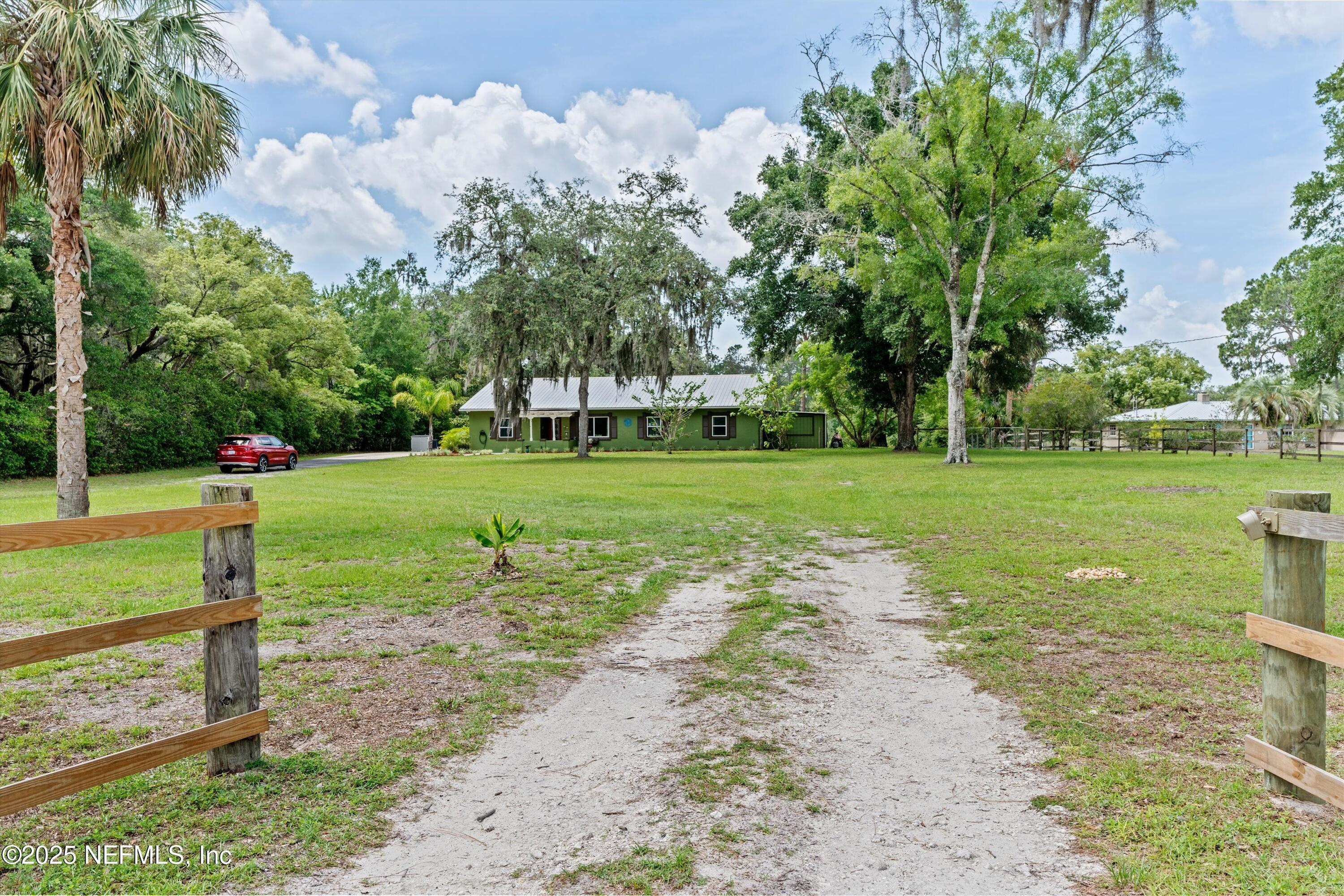 Image 2: Front 2- down driveway