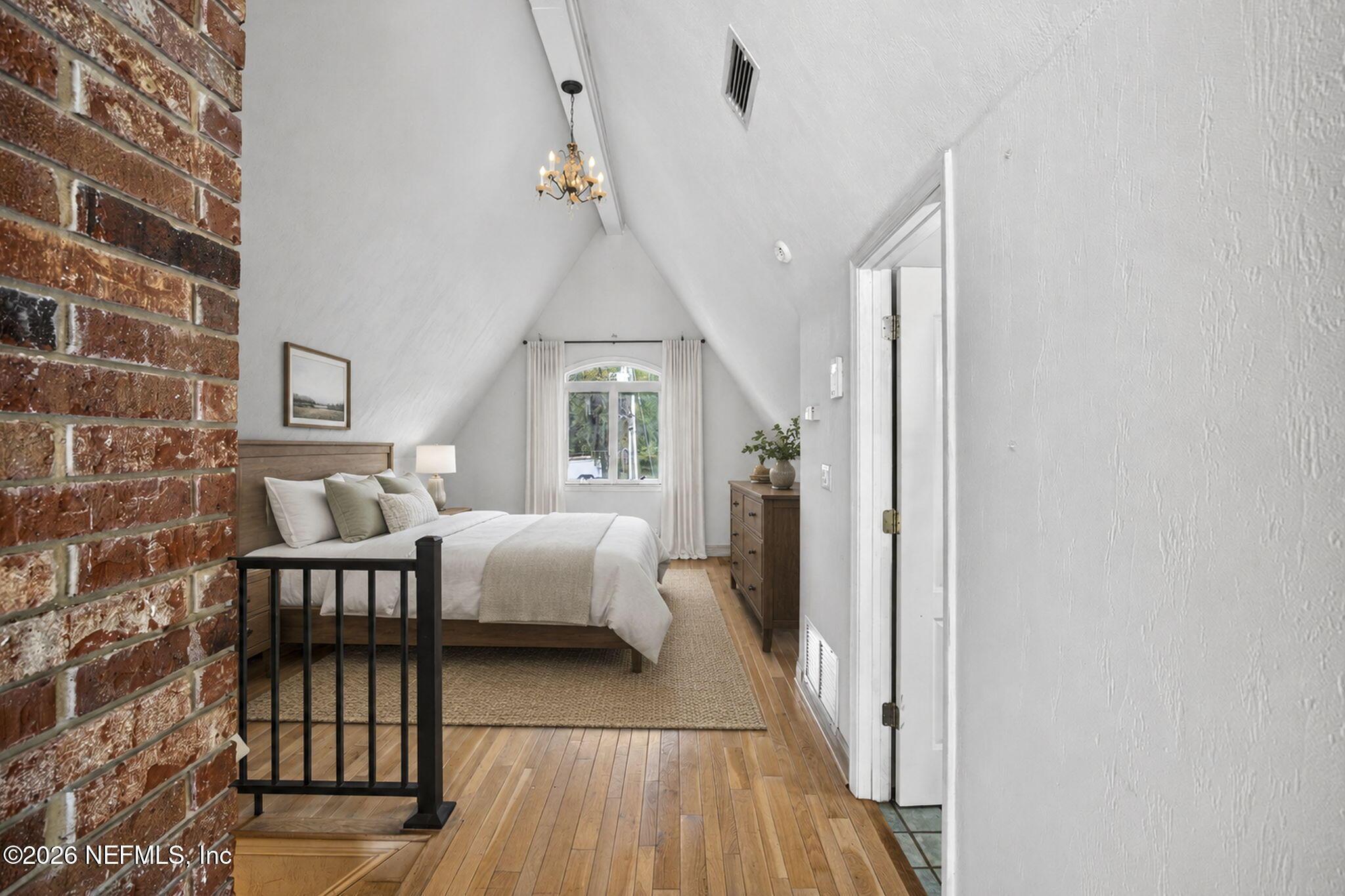 Image 4: 31-web-or-mls-virtually staged attic bed