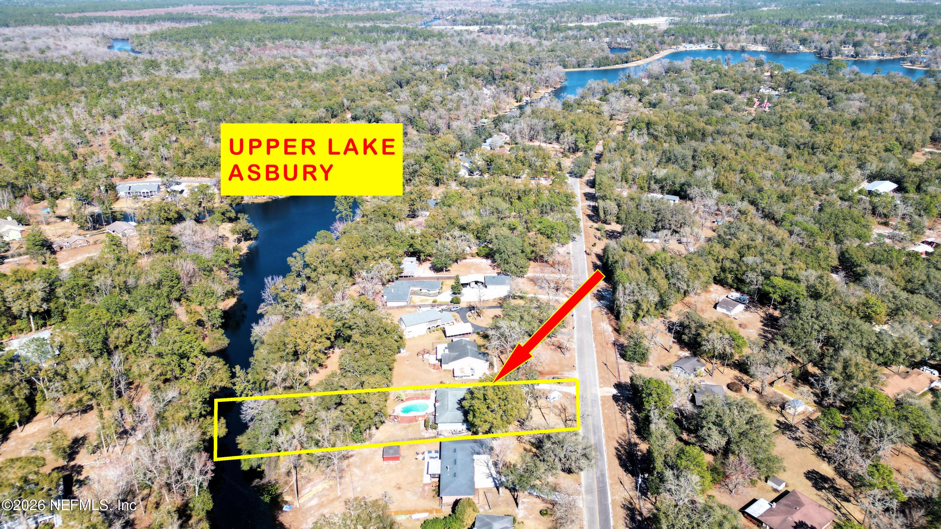 Image 2: Aerial view of Home and Lake Asbury