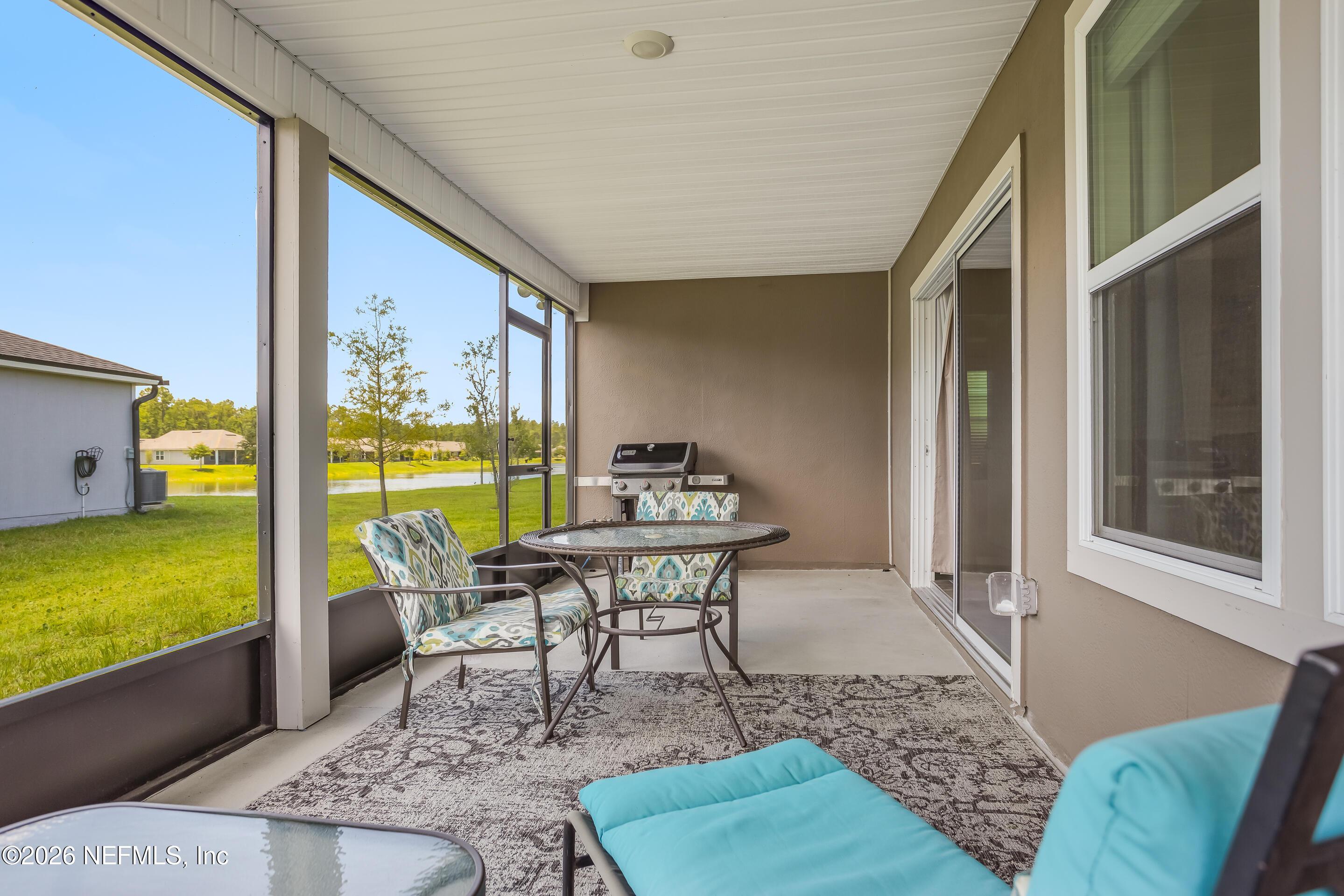Image 4: Screened Lanai with partial water view