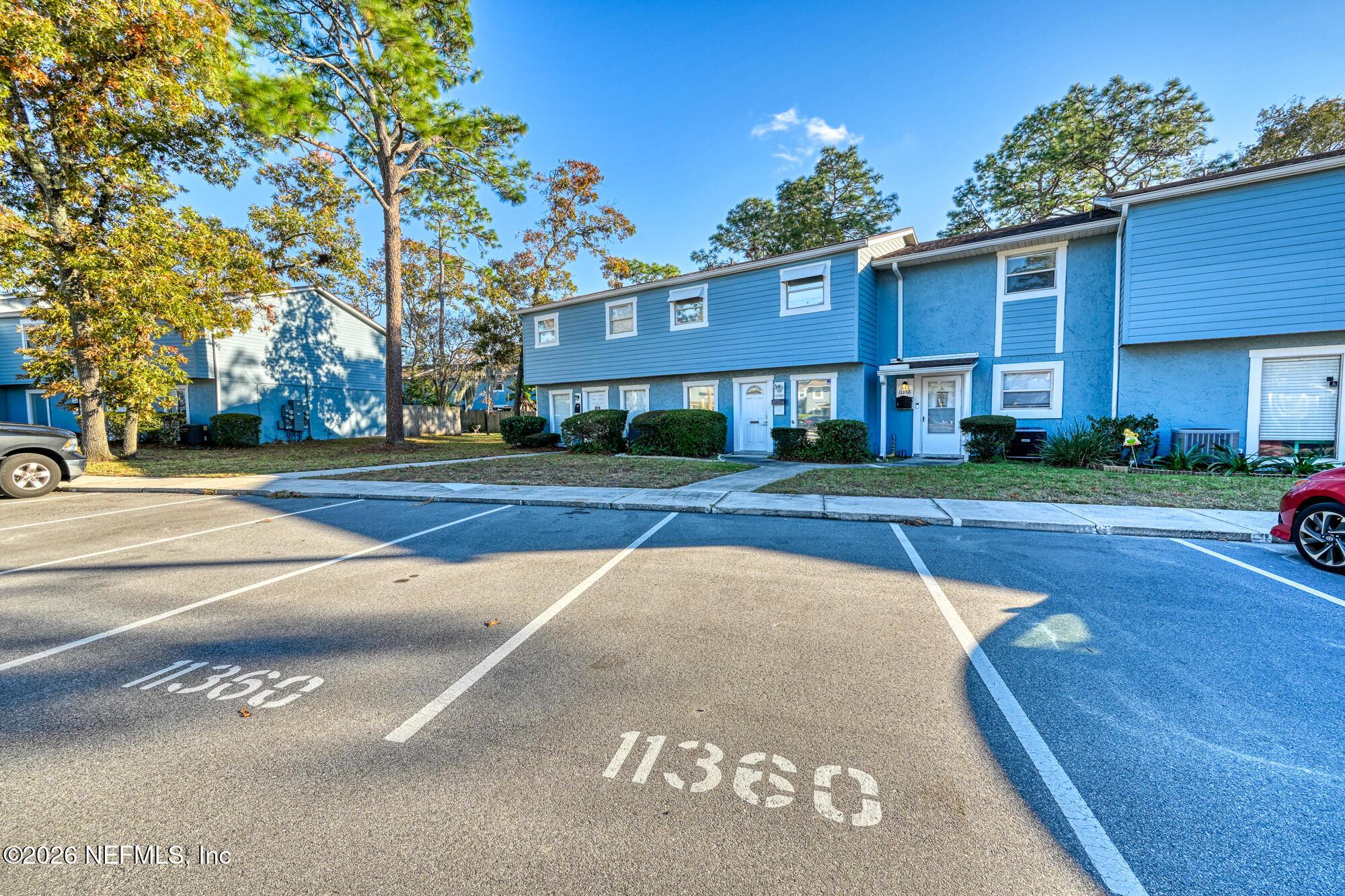 Image 1: Front of House - View 3 - With Parking S