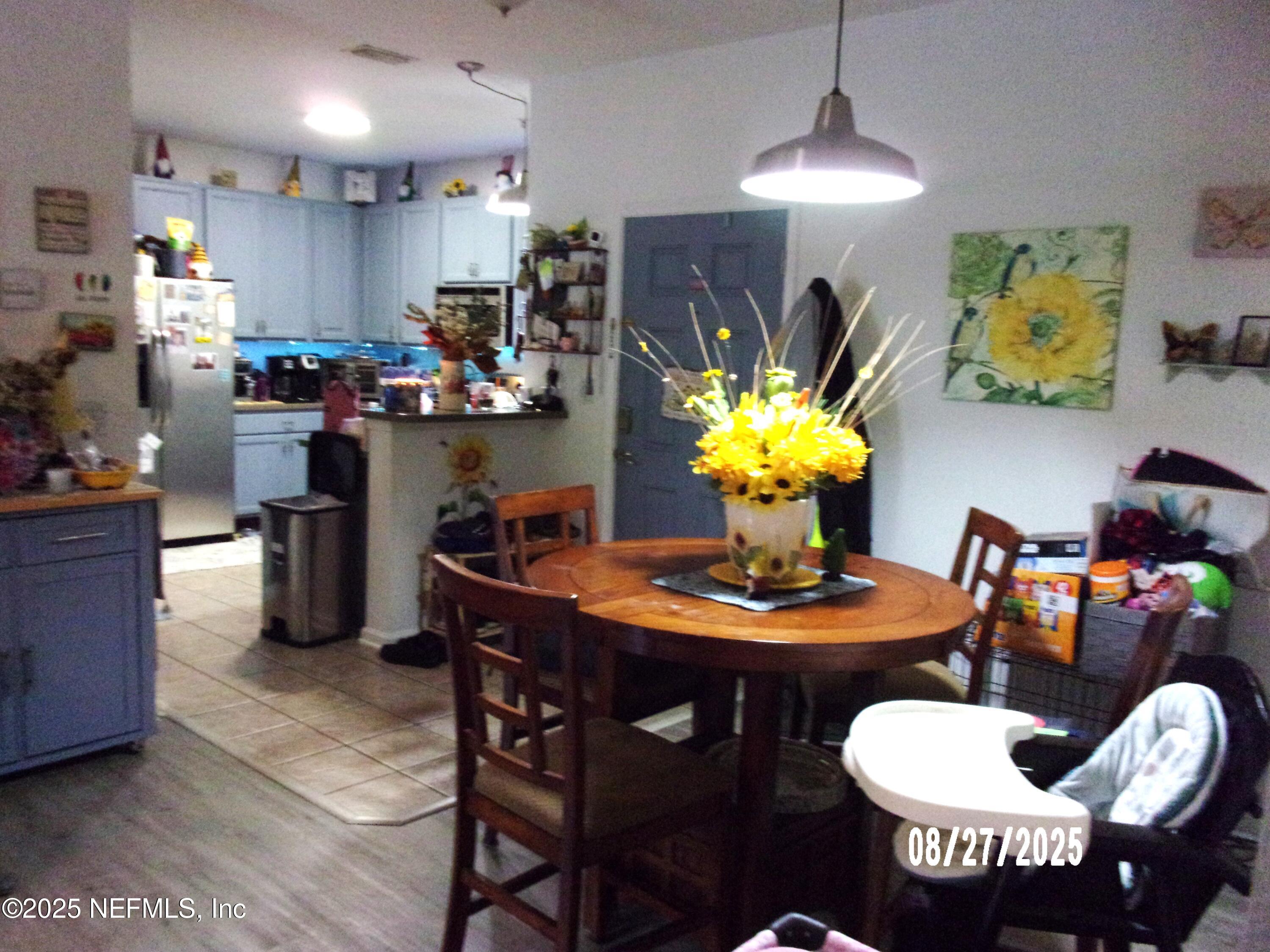 Image 4: Dining to Kitchen