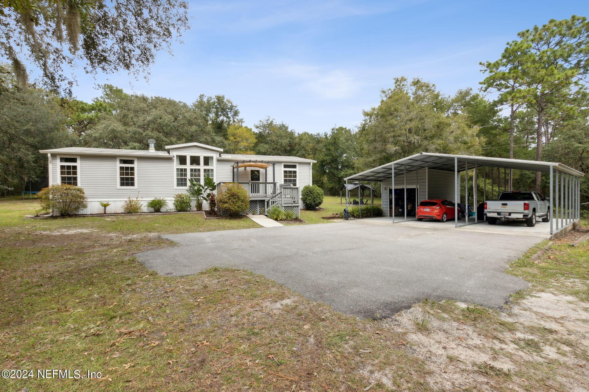 Image 2: Large Carport with RV storage