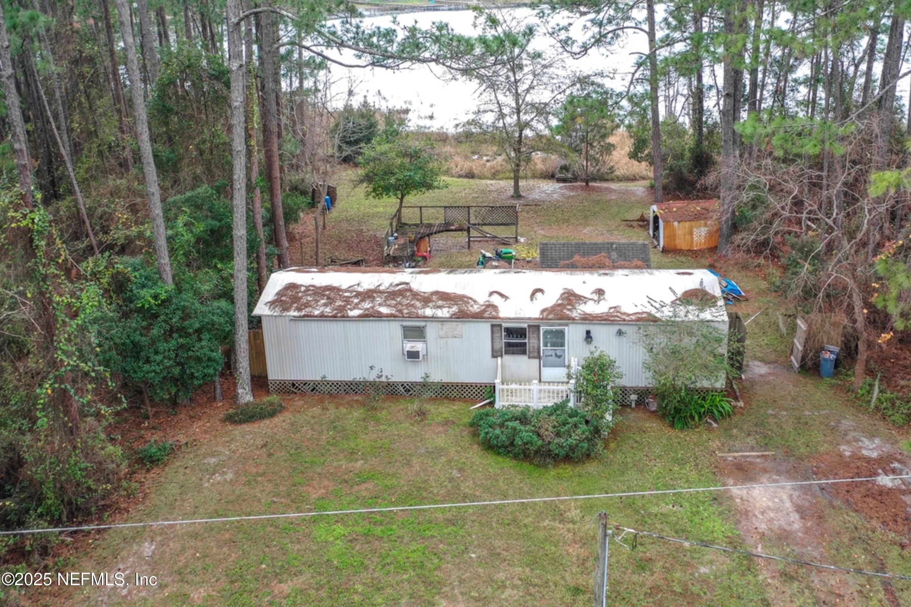 Image 1: Mobile Home In Forested Area Z