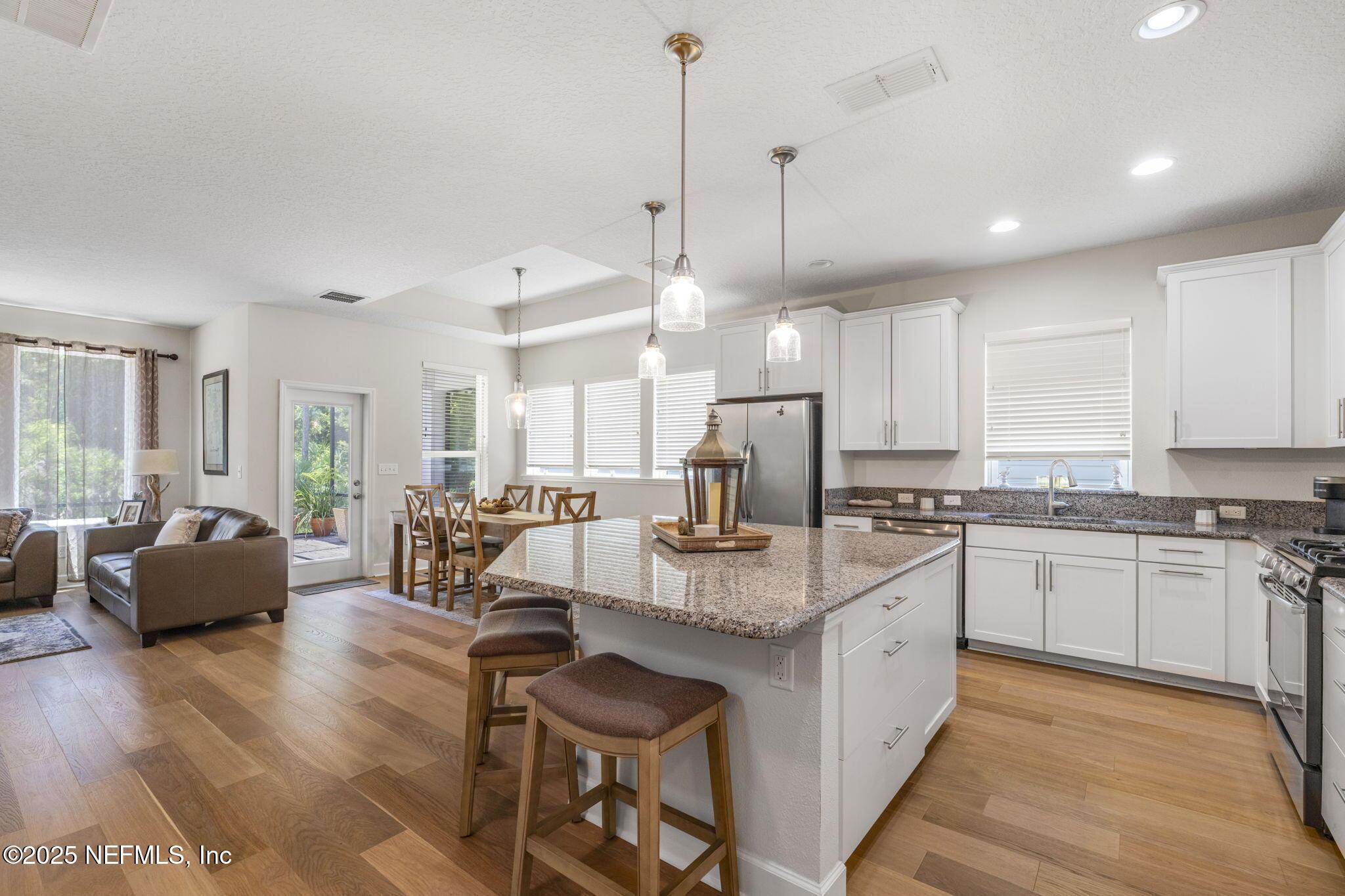 Image 3: Kitchen to Living Room