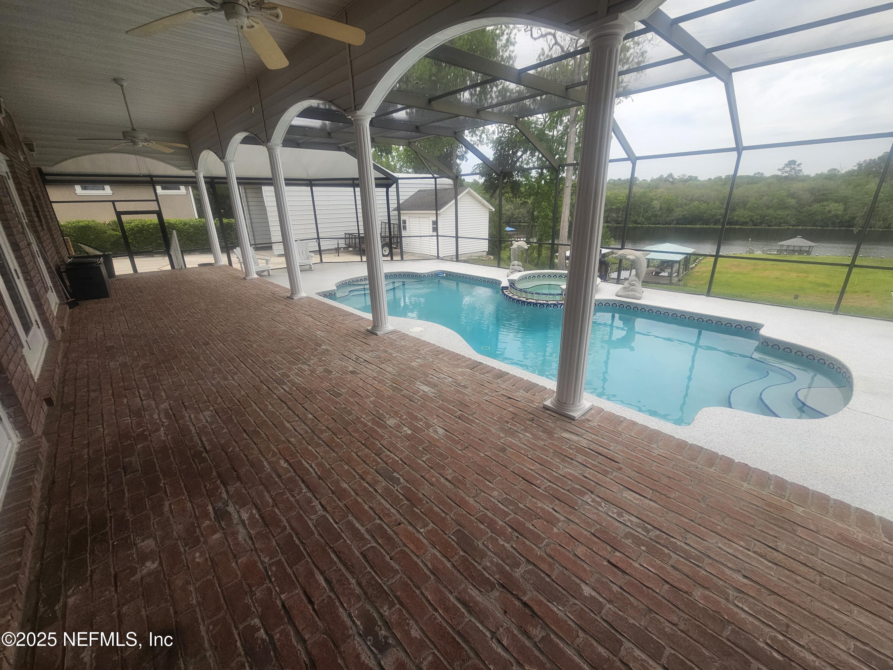 Image 2: Rear Porch Overlooking Pool