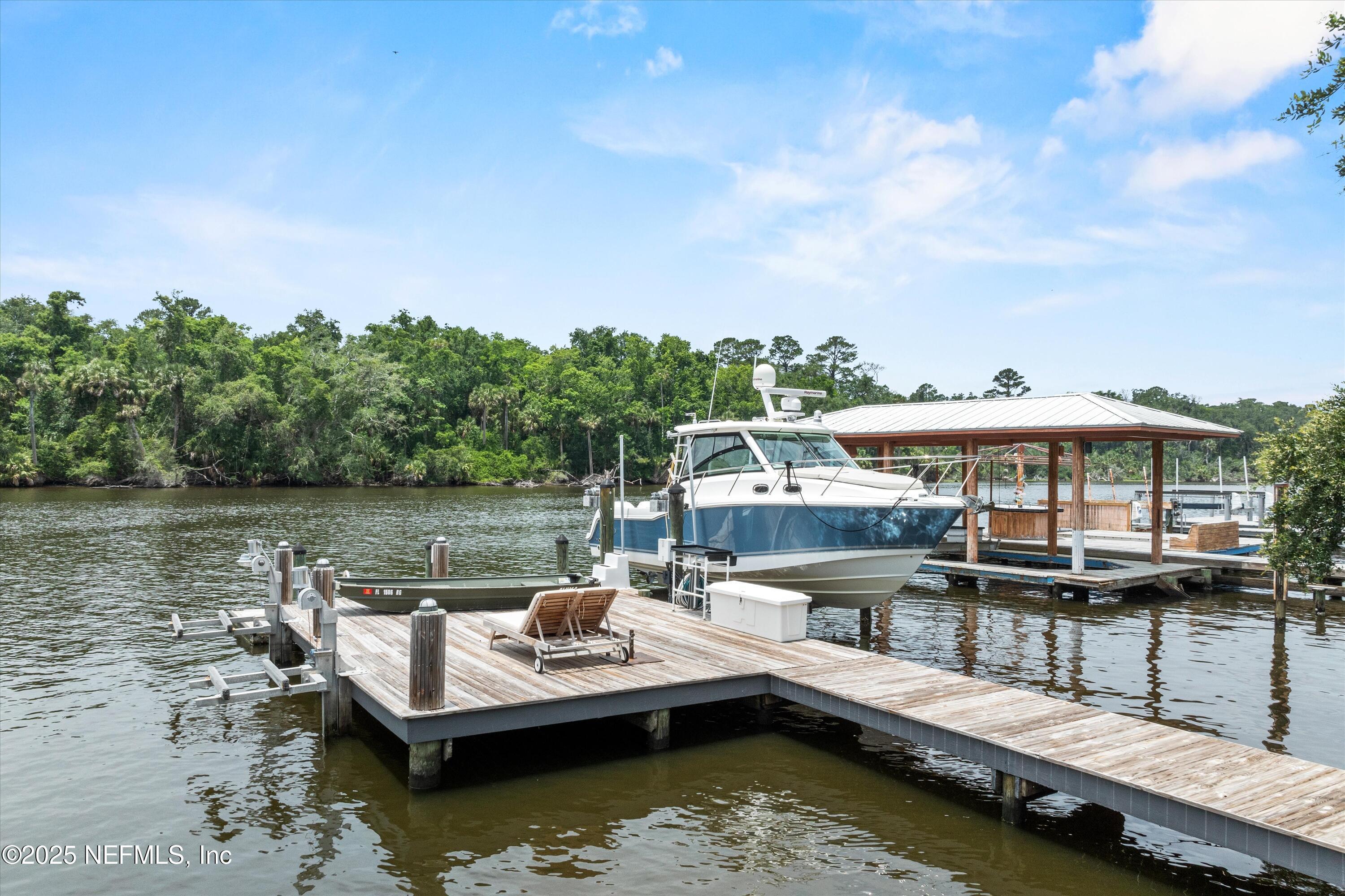 Image 2: Dock with Boat and Jet Ski Lifts