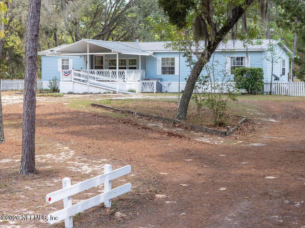 Image 1: 6328LittleLakeGenevaRdKeystoneHeightsFL-