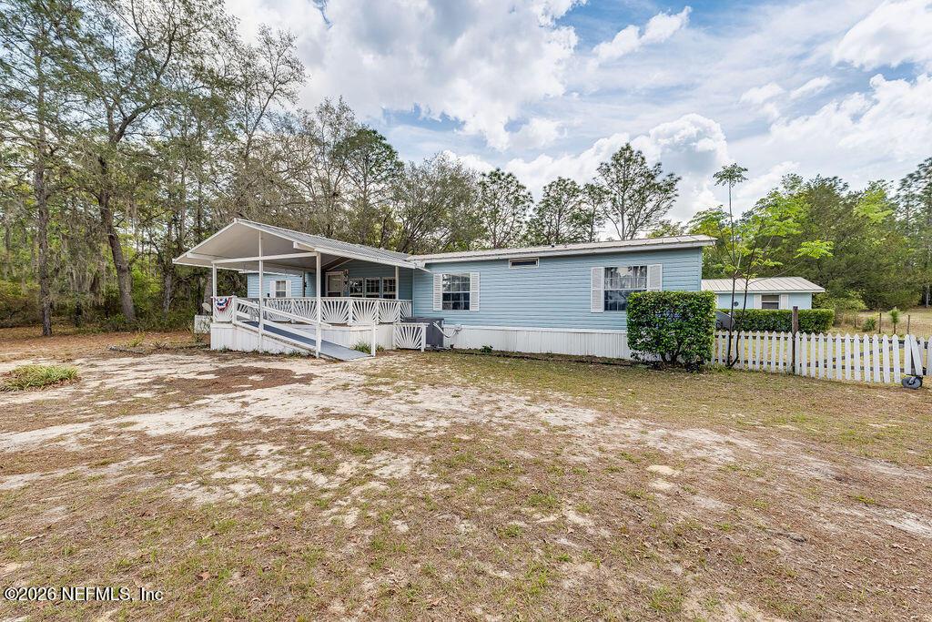 Image 4: 6328LittleLakeGenevaRdKeystoneHeightsFL-