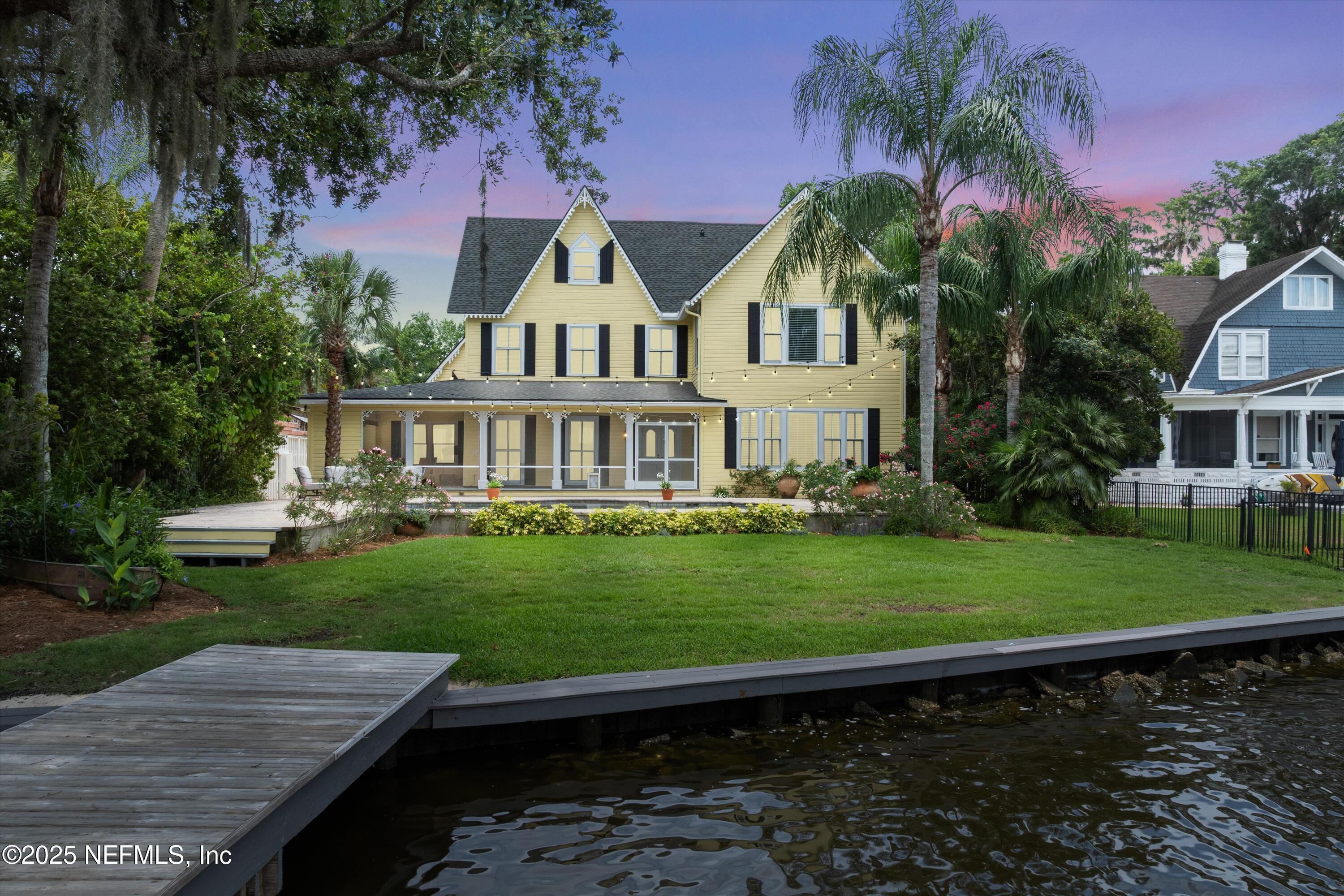 Image 1: Twilight View of Home from Intracoastal