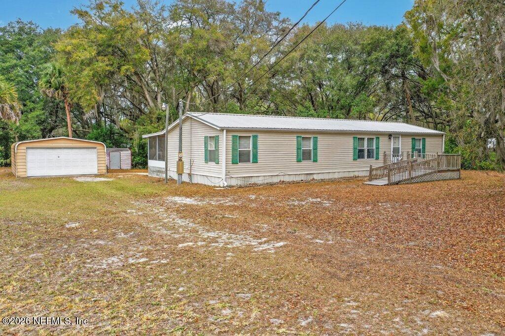Image 1: 035-207CabotLane-Satsuma-FL-32189-SMALL