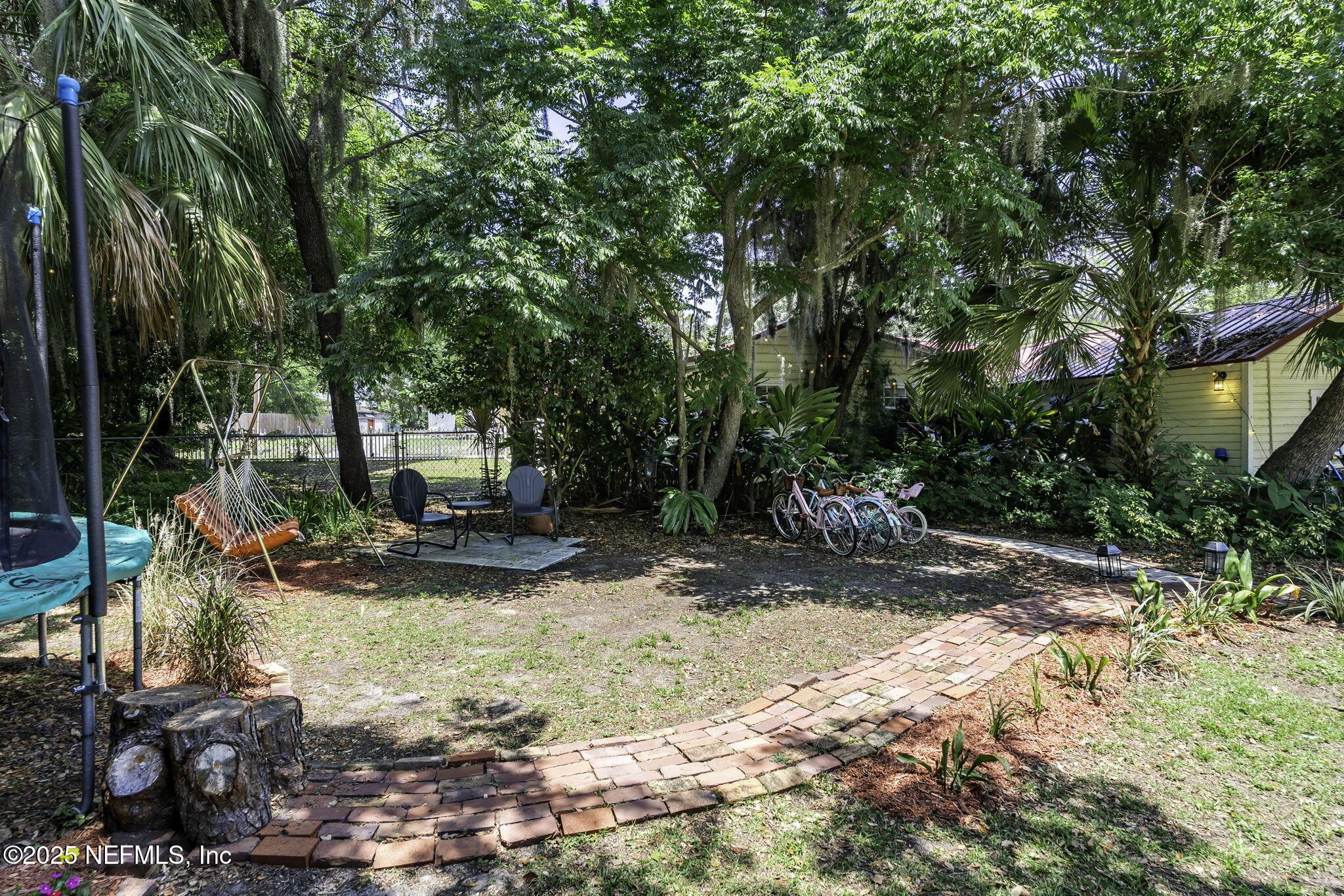 Image 4: VIEW OF PATH TO GUEST HOUSE
