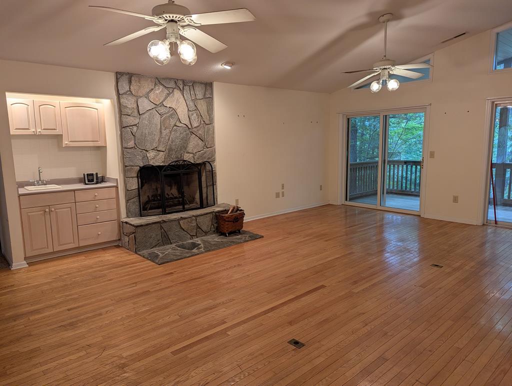 Image 4: Main level with Fireplace & Wet Bar