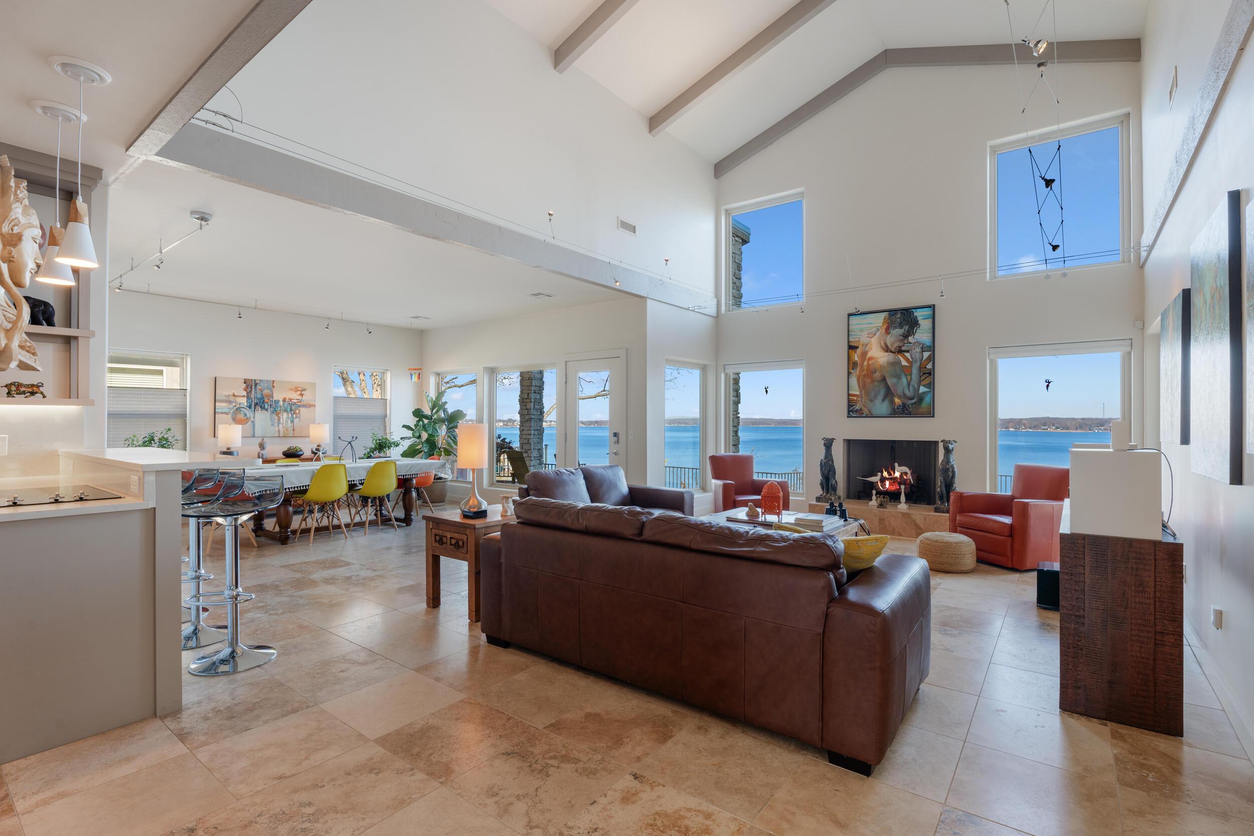 Image 4: Open living with vaulted ceilings