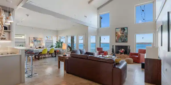 Image 4: Open living with vaulted ceilings