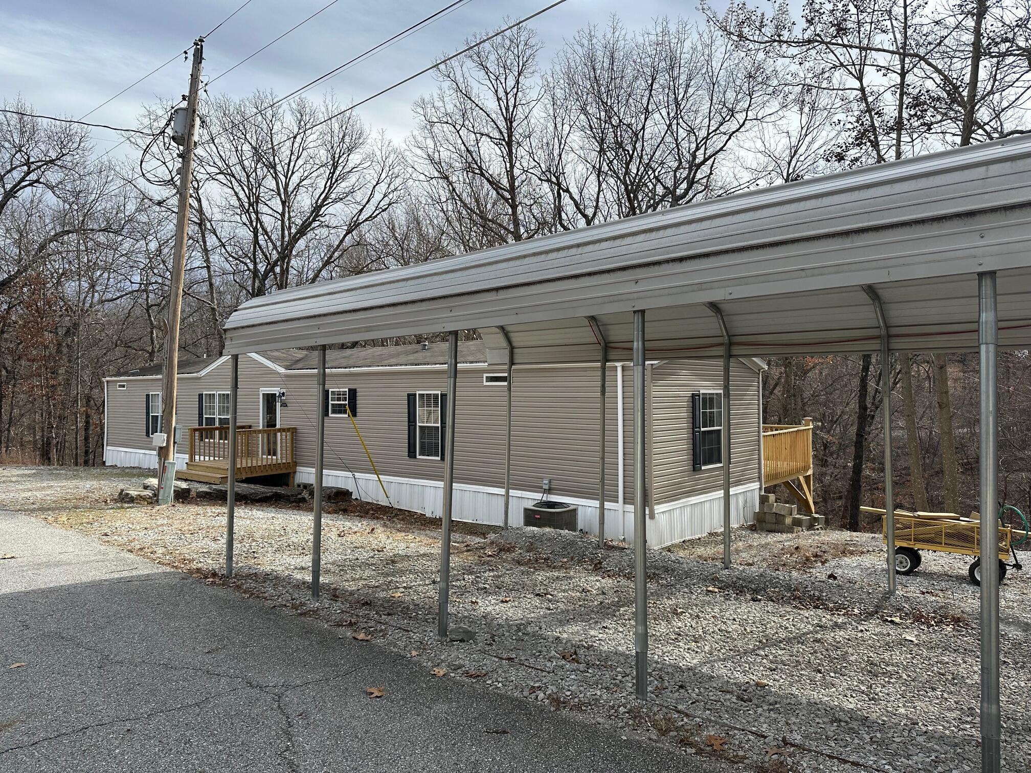 Image 3: carport and home