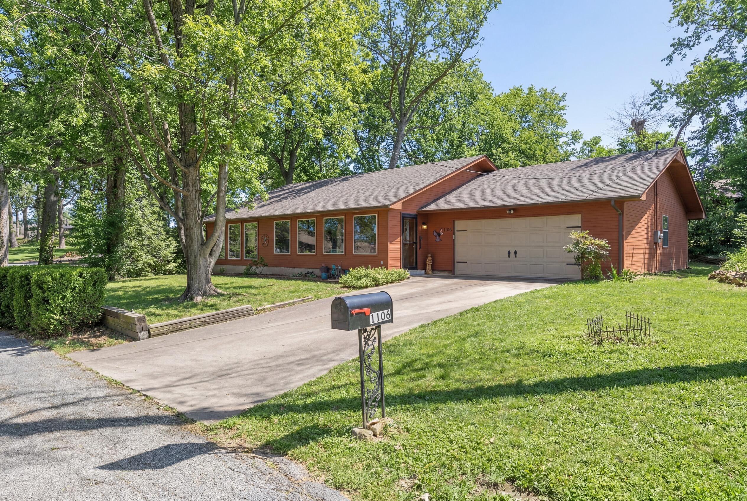 Image 2: Front Exterior &ndash; Driveway View