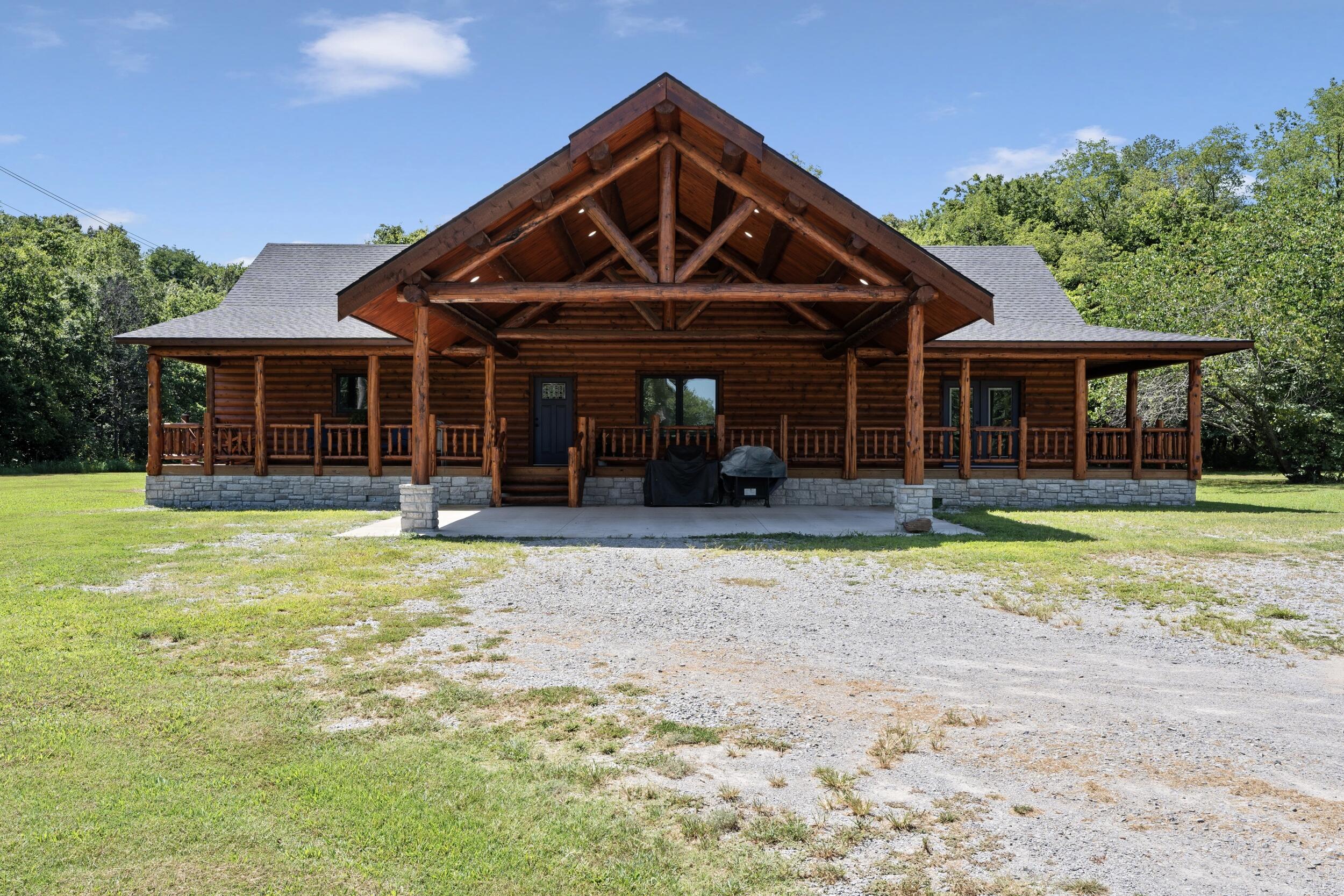 Image 1: Log home on 10 acres