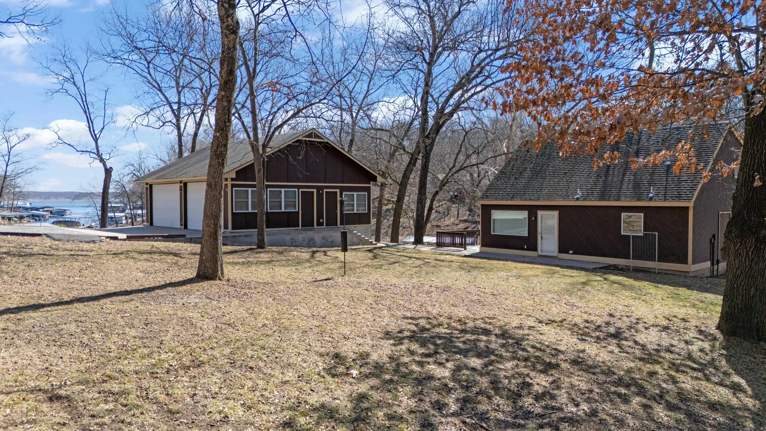 Image 1: house and garage