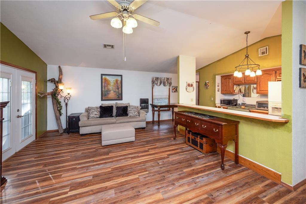 Image 3: Open Floorplan from Living into Kitchen