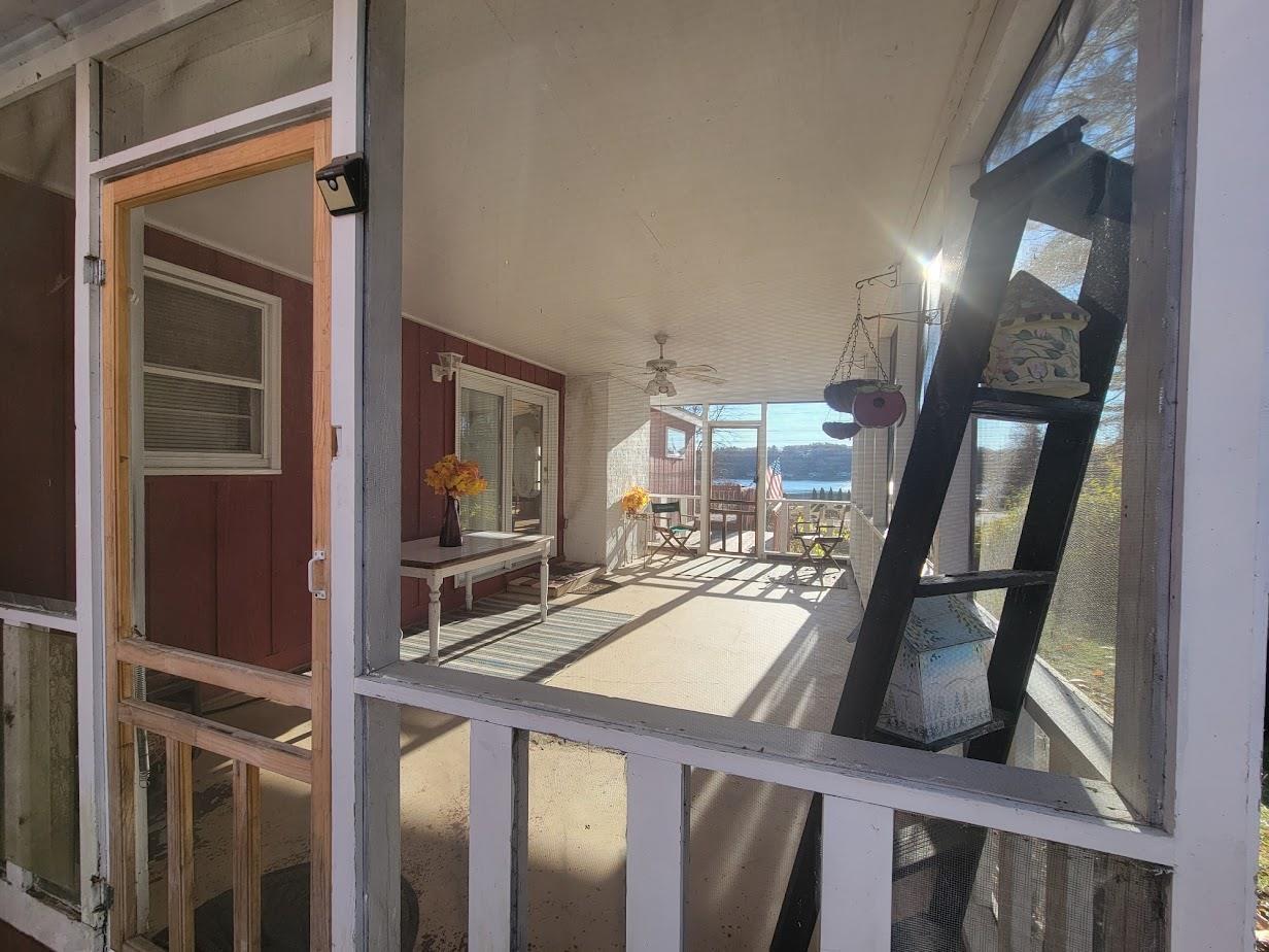 Image 3: summer evenings in this screened porch