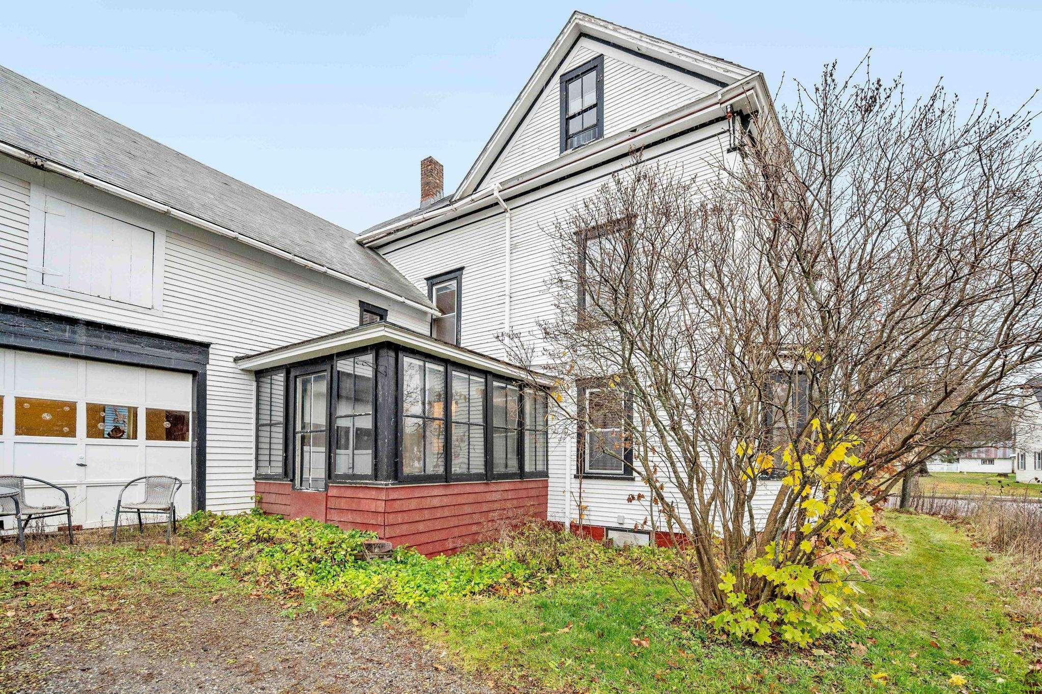 Image 4: Attached 2 car garage with storage above
