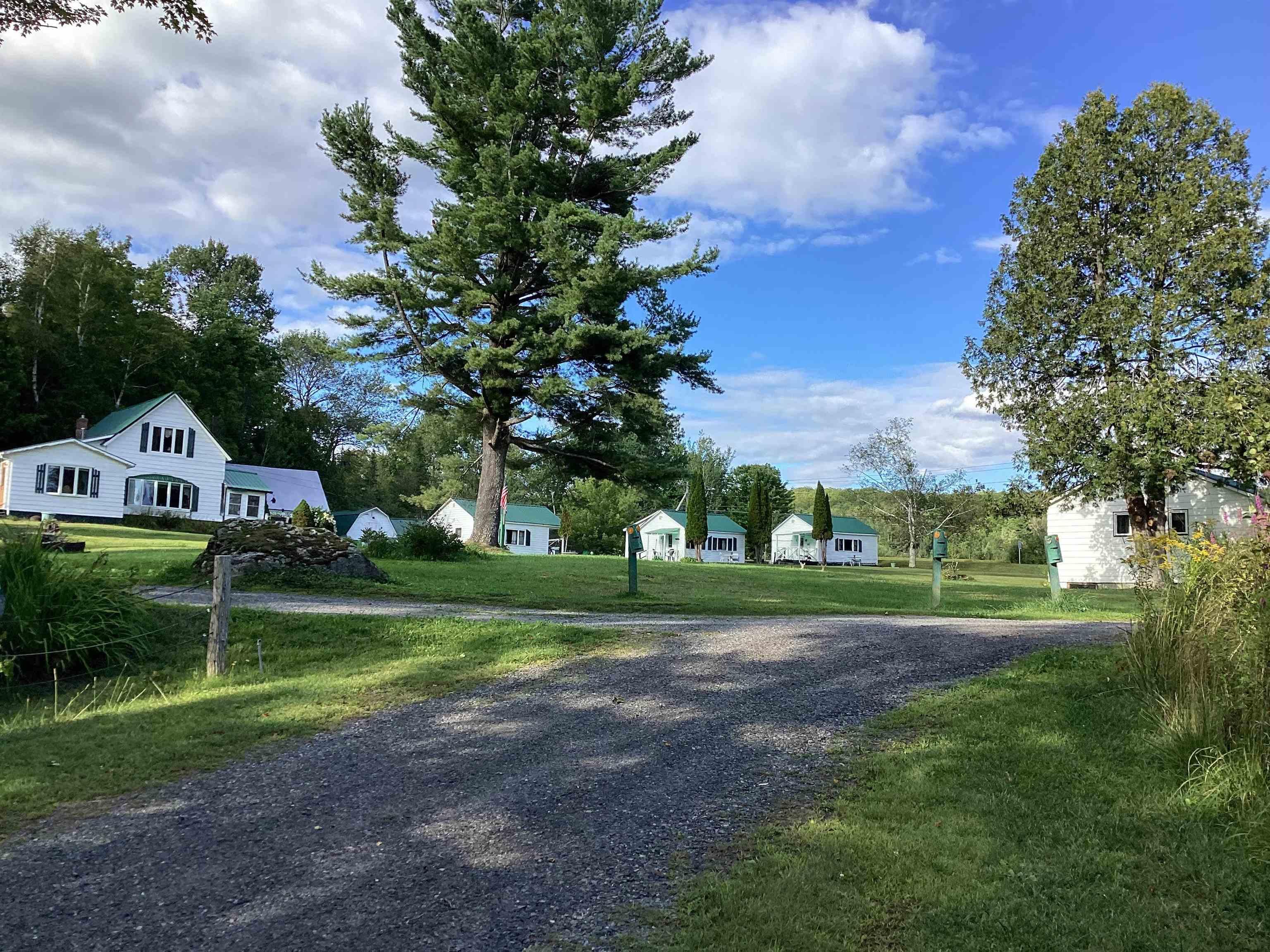Image 0: full time residence and 4 cottages