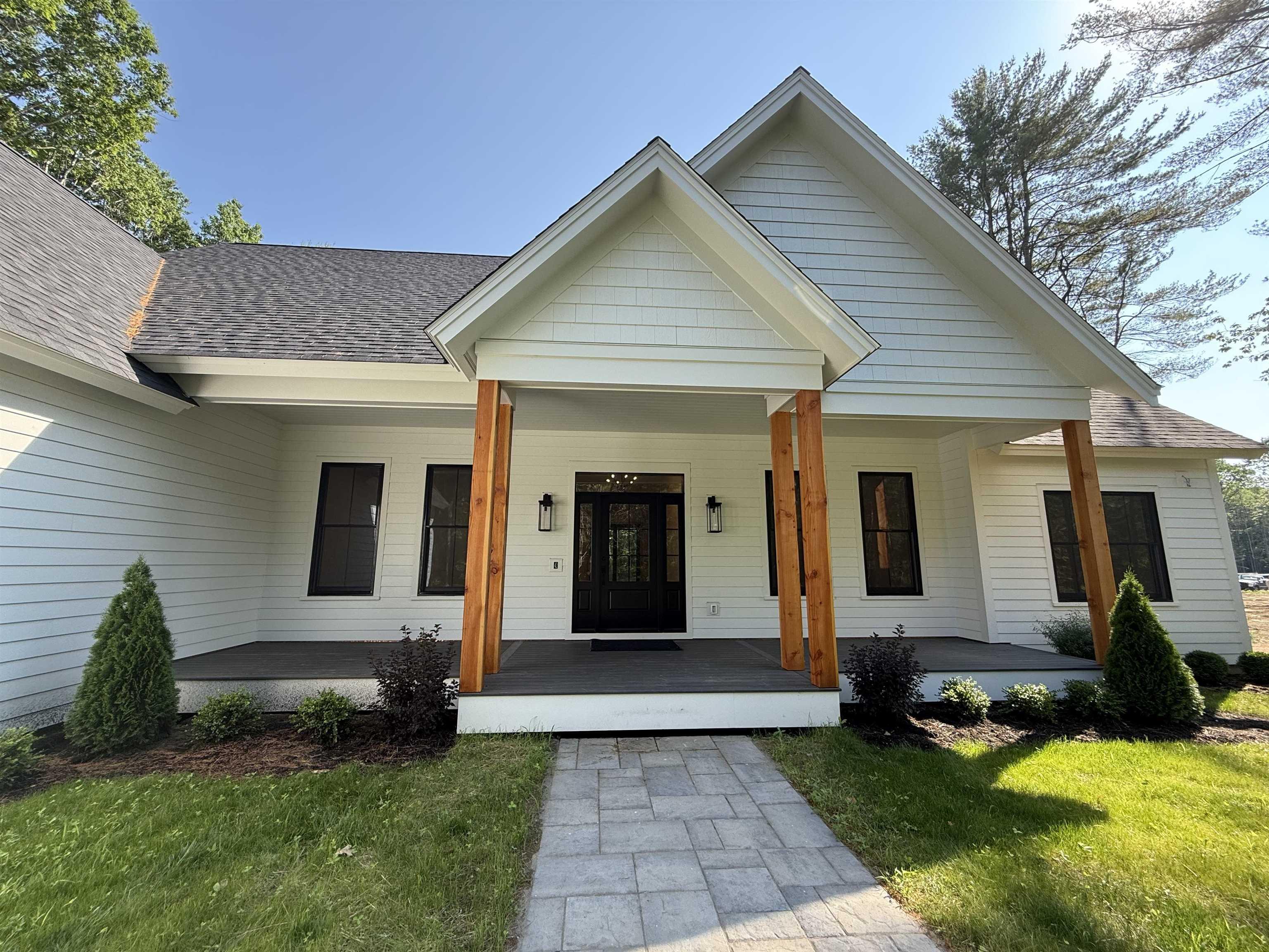 Image 1: The welcoming front porch and gabled roof create classic curb appeal Image 1: The welcoming front porch and gabled roof create classic curb appeal
