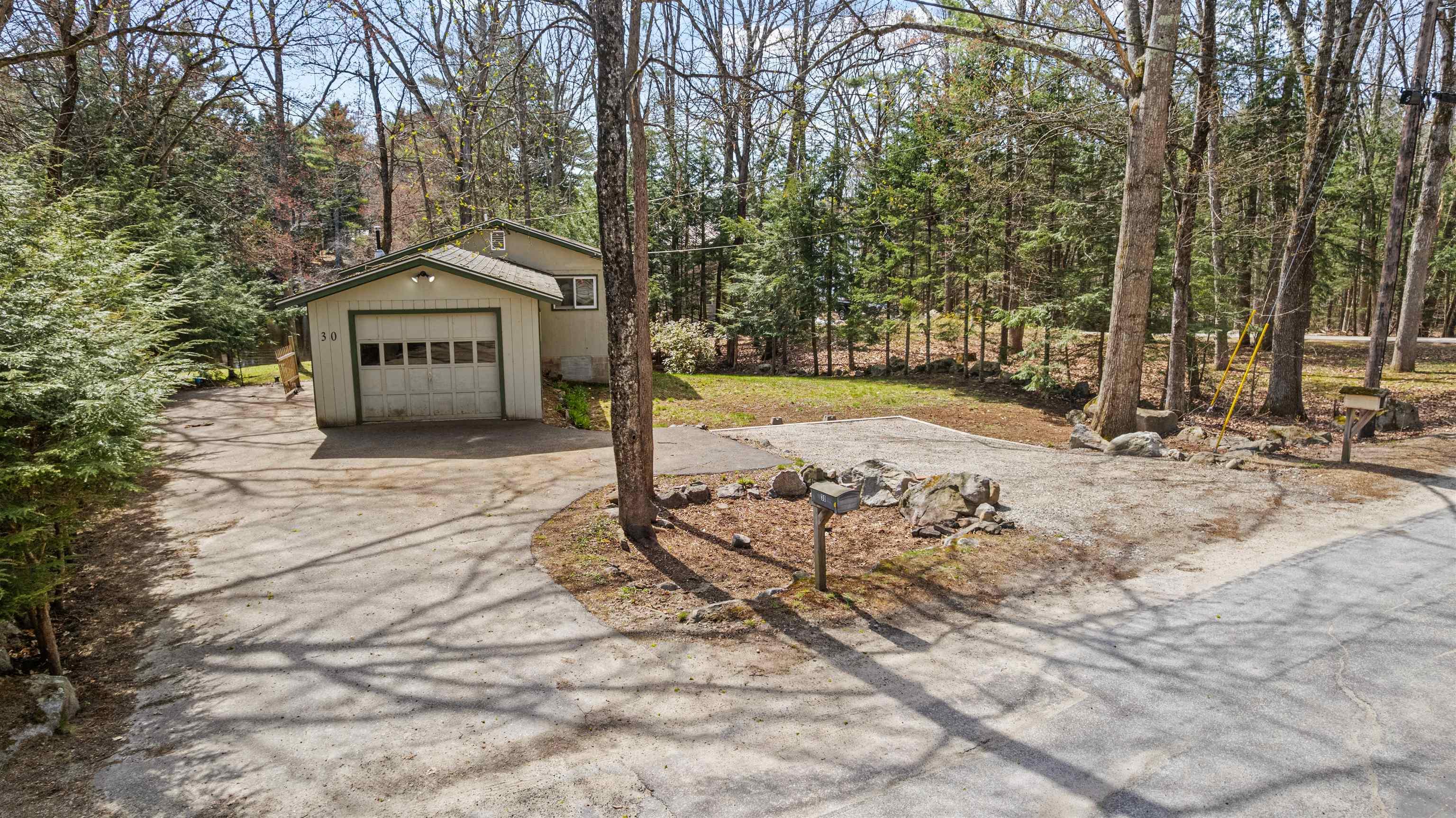 Image 3: One car garage and plenty of parking. Image 3: One car garage and plenty of parking.