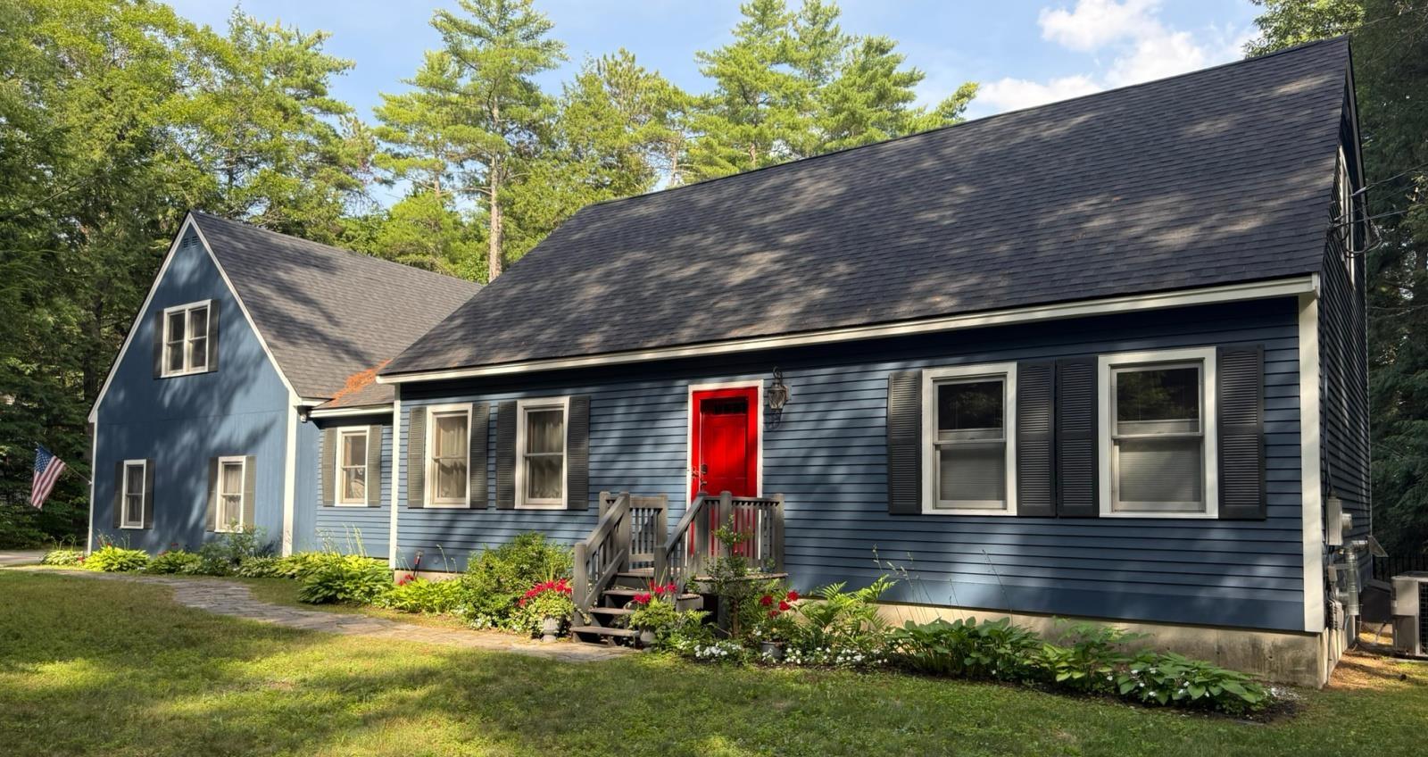 Image 1: A Charming Cape with a Back Yard Made for Living